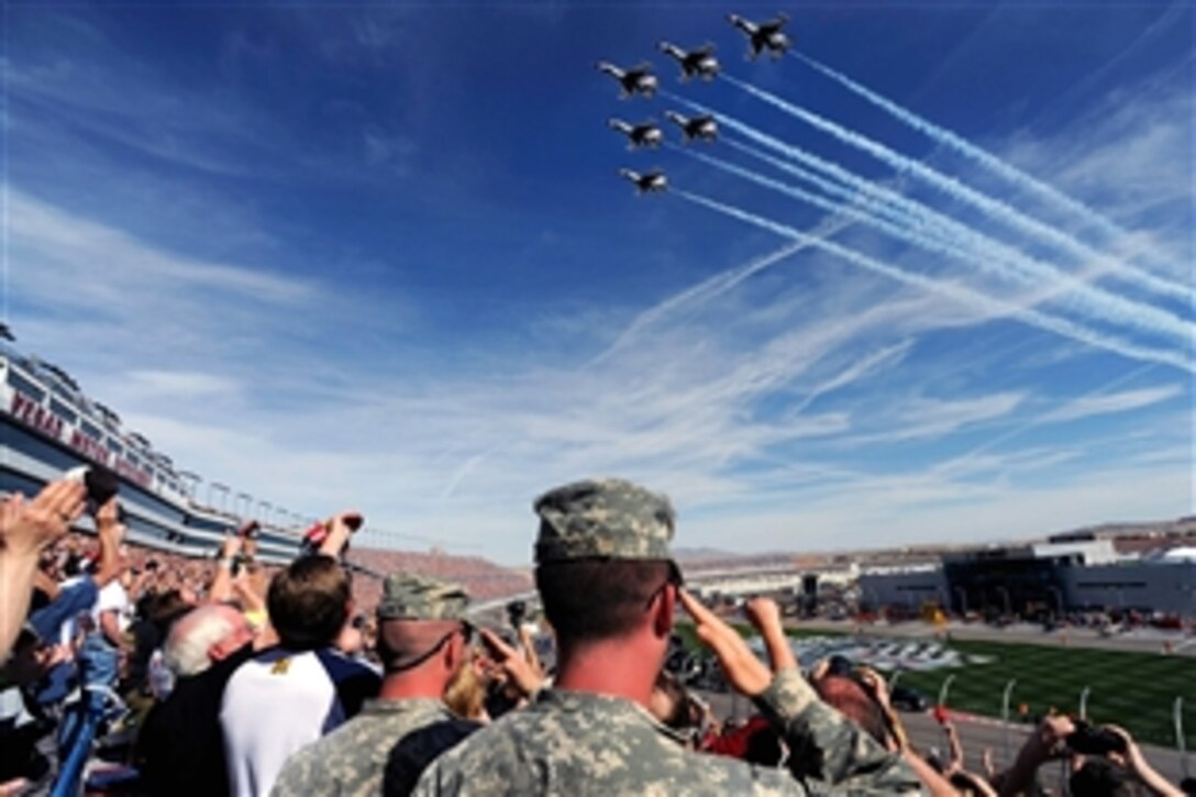 The U.S. Air Force Air "Thunderbirds," a demonstration squadron, fly over the Las Vegas Motor Speedway during the Shelby 427 NASCAR Nextel Cup race in Las Vegas, March 1, 2009.