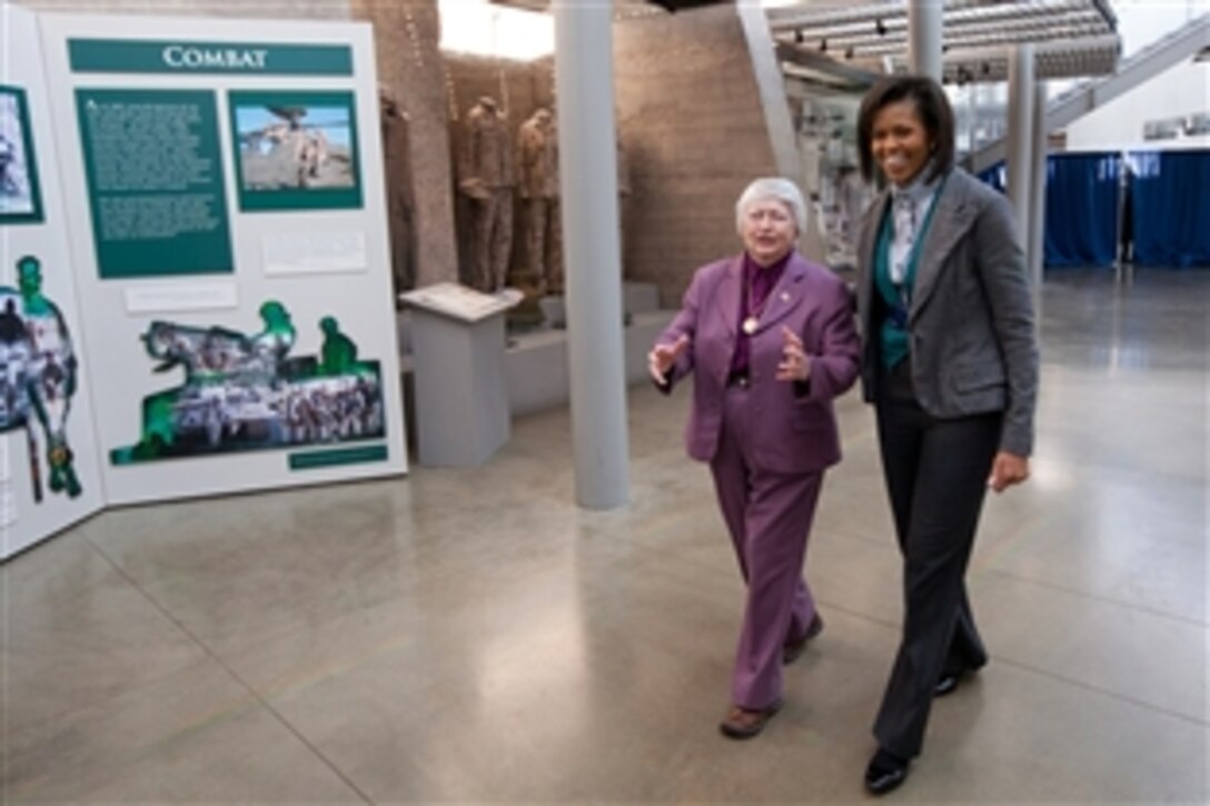 Retired Air Force Brig. Gen. Wilma Vaught, president of the Women’s Memorial Foundation, takes first lady Michelle Obama on a tour of Arlington National Cemetery's Women in Military Service for America Memorial Center in Arlington, Va., on March 3, 2009, during an event honoring Women's History Month and military families. 
