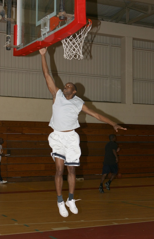 A prospective MCBH basketball team member performs a lay-up during practice March 5. Marines and sailors in Hawaii have been trying out for the chance to travel to play in the Men's West Coast Regional Basketball Tournament to be held at MCAS Miramar April 13-17.