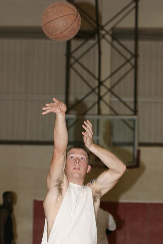 Lance Cpl. Jeffrey Farber, prospect for the MCBH basketball team, shoots a free throw during practice at the Semper Fit Center March 5. A team of 12-15 players will be selected to travel to MCAS Miramar for the Men's West Coast Regionaly Tournament April 13-17.