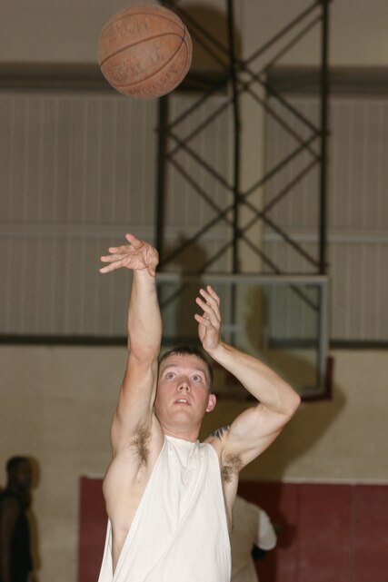 Lance Cpl. Jeffrey Farber, prospect for the MCBH basketball team, shoots a free throw during practice at the Semper Fit Center March 5. A team of 12-15 players will be selected to travel to MCAS Miramar for the Men's West Coast Regionaly Tournament April 13-17.