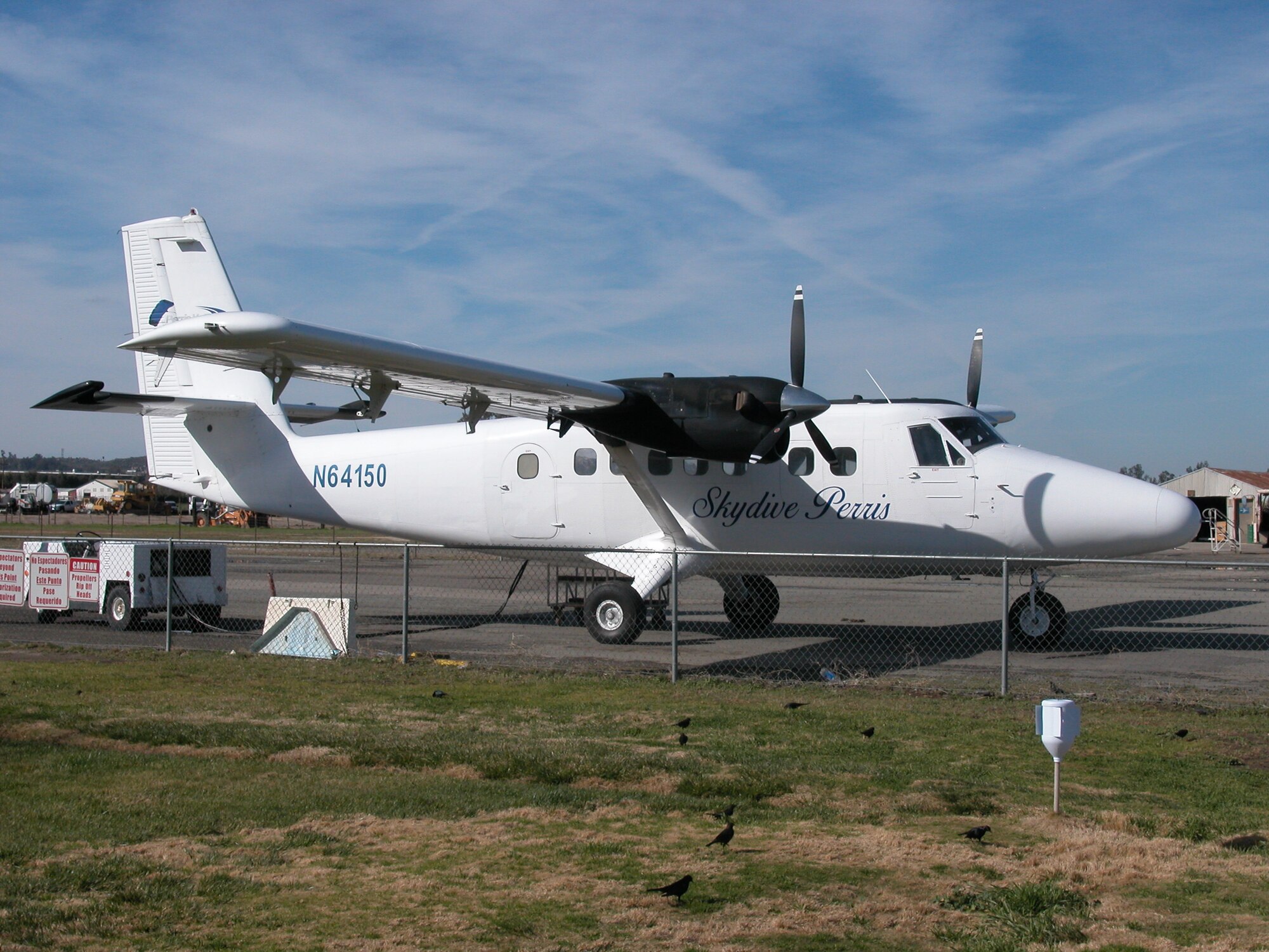 While training for their upcoming demonstration season, the Canadian SkyHawks gave two 452 AMW Public Affairs employees tandem jumps during their practice sessions. The team uses the local jump plane.  (U.S. Air Force photo by
Staff Sgt Megan Crusher)