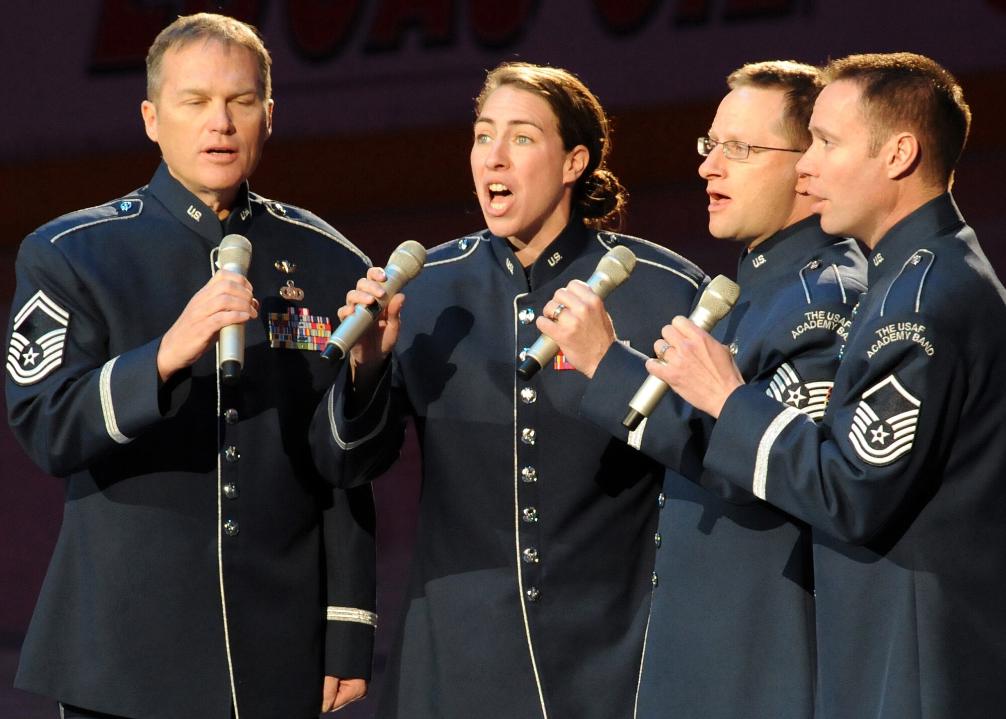 Members of the USAFA Band perform God Bless America and the National Anthem at the Staples Center in Los Angeles, Calif., before the LA Kings play the Phoenix Coyotes, Feb 21. “Blue Steel” is a component of the United States Air Force Academy Band that performs popular music to enhance community relations and support the recruiting mission of the U.S. Air Force.  (Photo by Atiba S. Copeland)