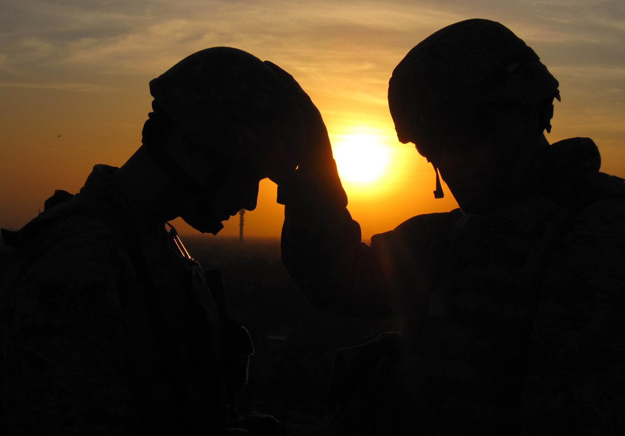 Chaplain (Capt.) David Haltom provides spiritual guidance to a joint expeditionary tasked Airman in a combat zone Feb. 23 in Southwest Asia. Chaplain Haltom is the 732nd Air Expeditionary Group chaplain. (Courtesy photo) 
