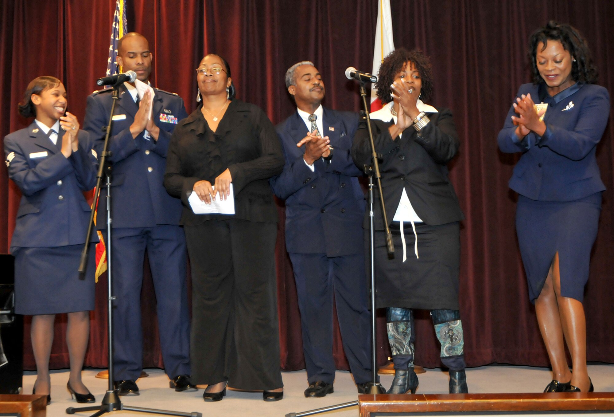 Singers perform during the Black History month luncheon celebrated jointly by SMC and The Aerospace Corporation, Feb. 19.  Keynote speaker, Dr. Terrence Roberts, a member of the Little Rock Nine, spoke of his experiences as one of the nine students who attended Central High School in Little Rock, Ark. and of his perspectives on integration in the United States. (Photo by Atiba S. Copeland)