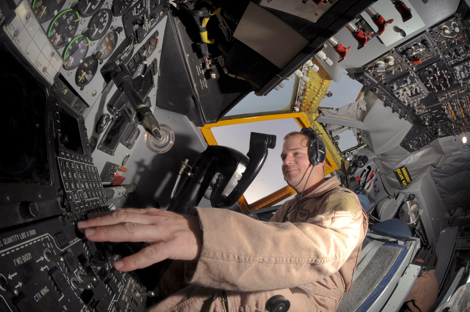 1st lieutenant Clint Waitkus, a pilot with the 340th Expeditionary Air Refueling Squadron, pre-flights a KC-135R Stratotanker prior to take off, March 5, 2009, in an undisclosed location in Southwest Asia.  The pilots and boom operator all run through pre-flight checks to ensure all systems are operating properly and the aircraft is mission ready.  Lieutenant Waitkus is native to Tucson Ariz. and is deployed from Royal Air Force, Mildenhall, England in support of Operations Iraqi and Enduring Freedom and Combined Joint Task Force - Horn of Africa. (U.S. Air Force Photo by Staff Sgt. Joshua Garcia/released)
