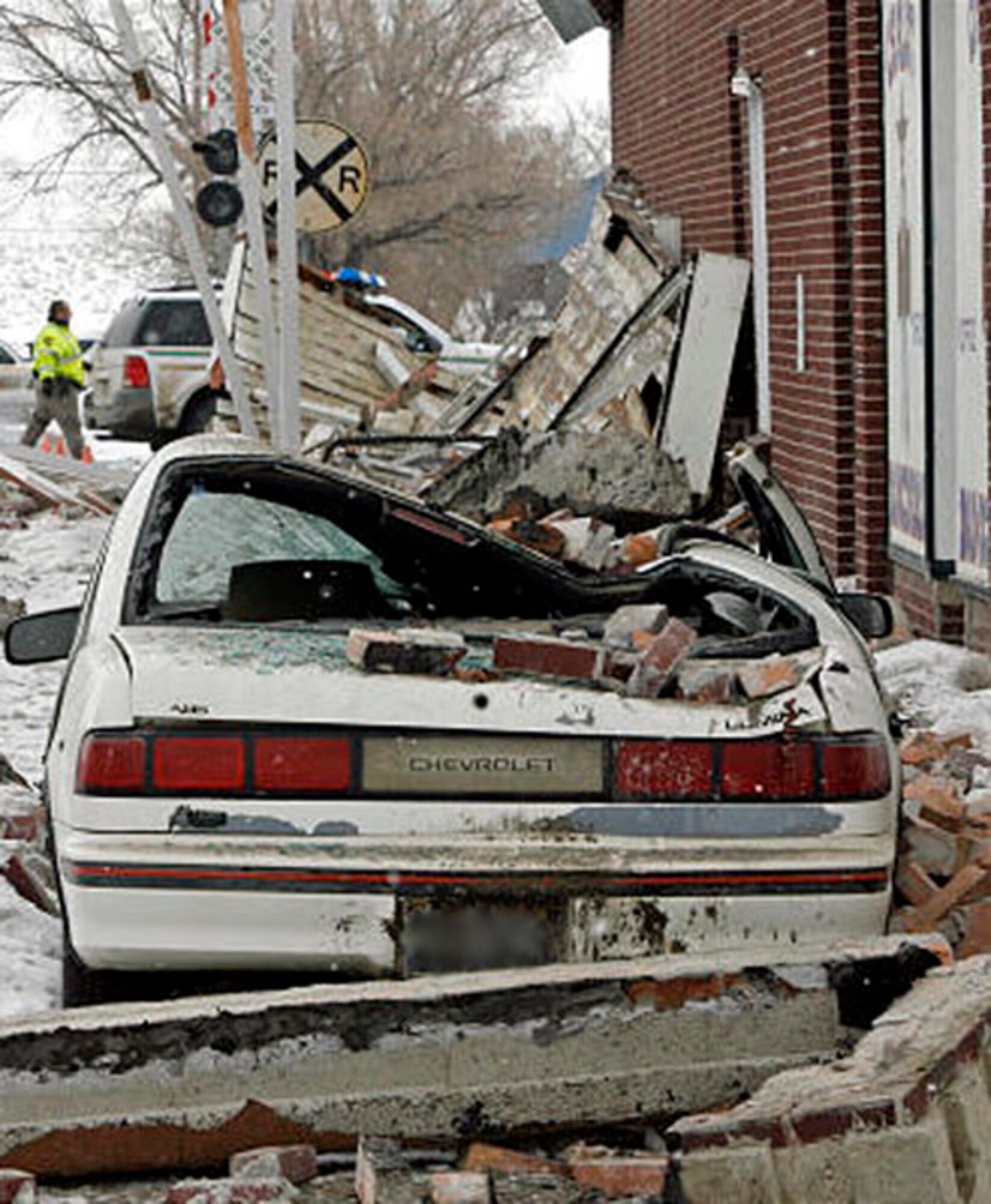 WELLS, Nev. – A damaged car sits in front of the Wells Chalet Bar and Casino surrounded by debris in Wells, Nev., after a 6.0 magnitude earthquake Feb. 21, 2008. Senior Airman Randal Kyllo, then assigned to the 3rd Contracting Squadron in Elmendorf Air Force Base, Alaska, was visiting his family in Winnemucca, Nev., when the earthquake hit. Airman Kyllo, now assigned to the 52nd Contracting Squadron, received an Air Force Achievement Medal for the assistance he provided on scene. (Courtesy photo)