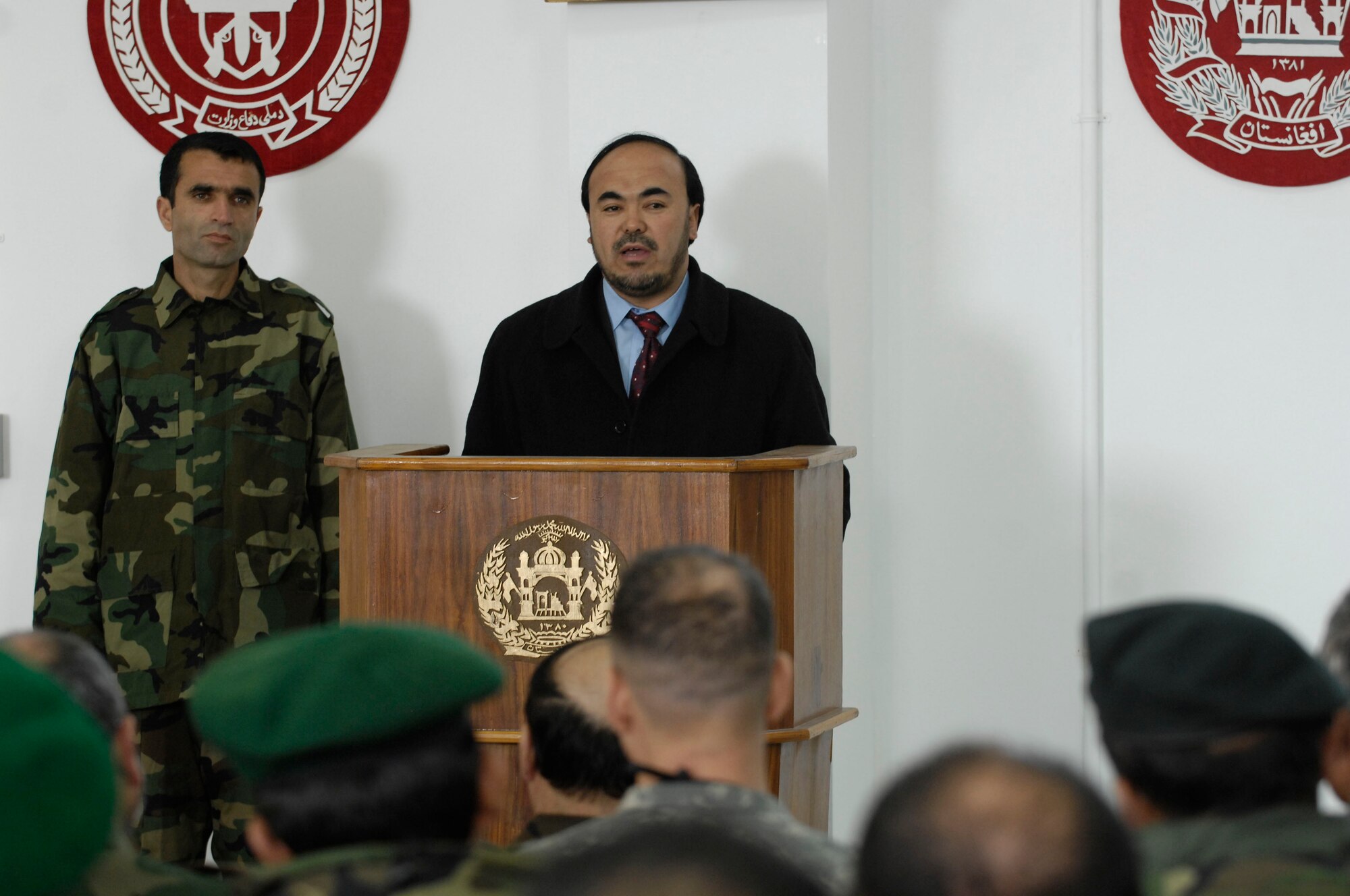 Afghan Assistant Defense Minister Lt. Gen. Jawhari, chief of acquisition, technology and logistics, speaks to a crowd of Afhanistan National Army soldiers and U.S. military members at the Feb. 28 inauguration of the Khuja Rawash Class III Fuels Depot in Kabul. "Today we've unlocked the key to sustaining our military," said General Jawhari. "We appreciate the commitment of the coalition to the success and independence of Afghanistan."  (U.S. Air Force photo/ Maj. Carie A. Parker)(Released)
