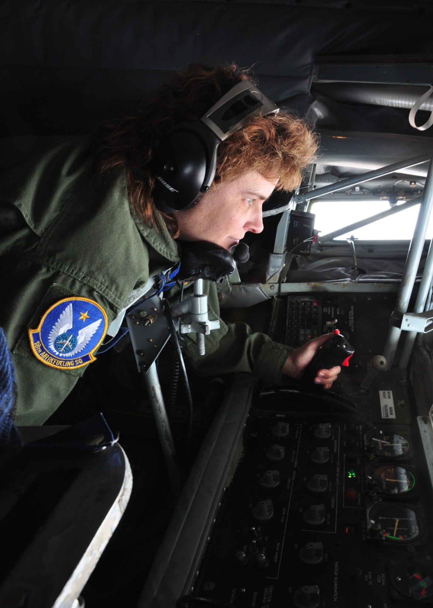 Master Sgt. Debra Lee guides the boom of a KC-135 Stratotanker during an aerial refueling mission. Sergeant Lee is one of several female boom operators assigned to the 18th Air Refueling Squadron, the flying unit of the 931st Air Refueling Group. March is Women's History Month. (Courtesy photo/Lt. Col. Tsuyoshi Tung)