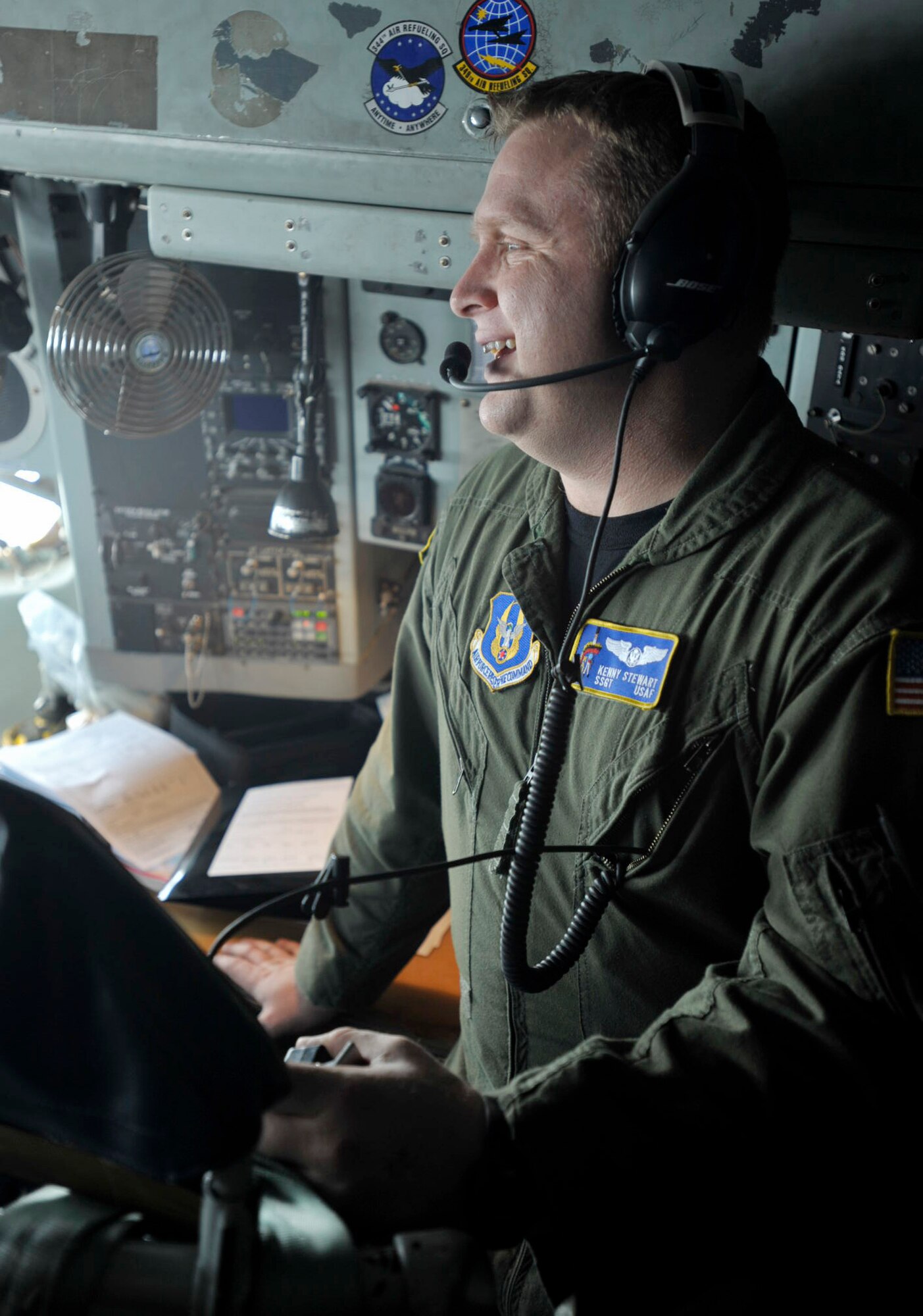 Staff Sgt. Steven "Kenny" Stewart shares a laugh with his KC-135 Stratotanker aircrew during an aeromedical evacuation training mission the crew participated in from Feb. 27 to March 1. Sergeant Stewart was the KC-135 boom operator assigned to the mission. He joined the 18th Air Refueling Squadron (the flying unit of the 931st Air Refueling Group) in January. (U.S. Air Force photo/Tech. Sgt. Jason Schaap) 