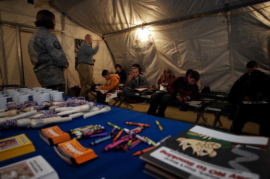 The 86th Construction and Training Squadron hosted this month's Kids 4 Kids event at tent city Feb. 27, 2009, at Ramstein Air Base. K4K is a monthly program for children with a deployed parent with events designed to help children understand better what their parent's do while deployed. (U.S. Air Force photo by Senior Airman Amber Bressler)