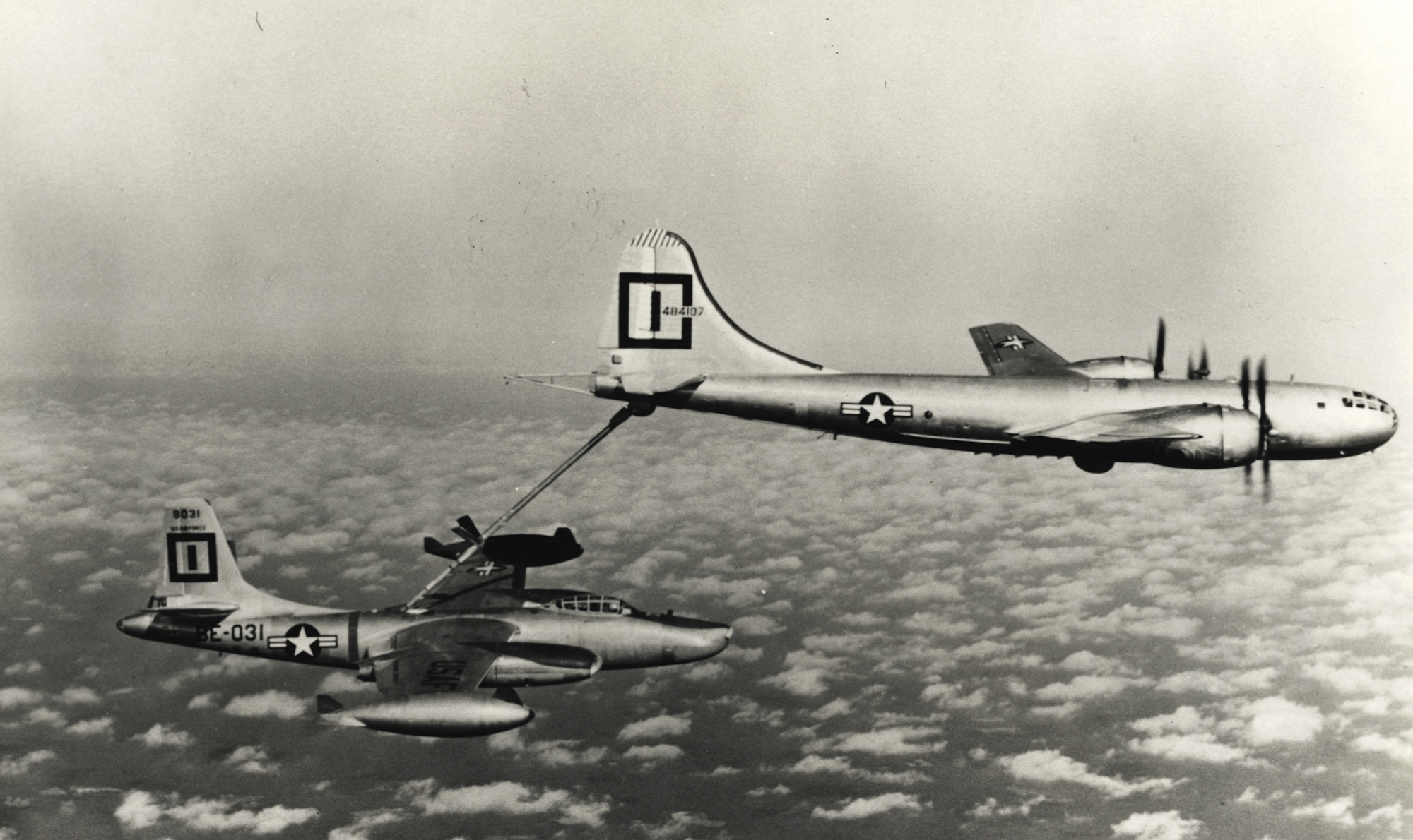 A KB-29P from the 91st Air Refueling Squadron, Barksdale Air Force Base, La., puts Strategic Air Command's long reach into practice by refueling an RB-45C of the 91st Strategic Reconnaissance Wing.  ( U.S. Air Force photo)