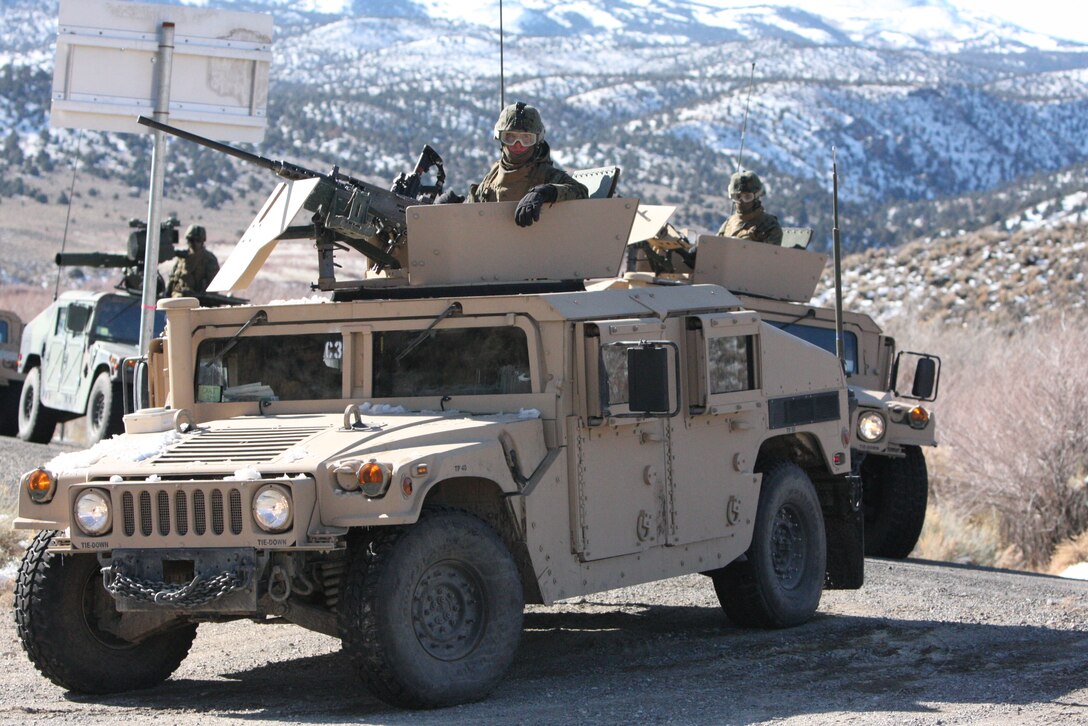 Marines and sailors of Weapons Company, 3rd Battalion, 4th Marine Regiment, turn off a main road on their way to a convoy training exercise taking place from Bridgeport, Calif., to Hawthorne Army Ammunition Depot in Hawthorne, Nev., March 7.
