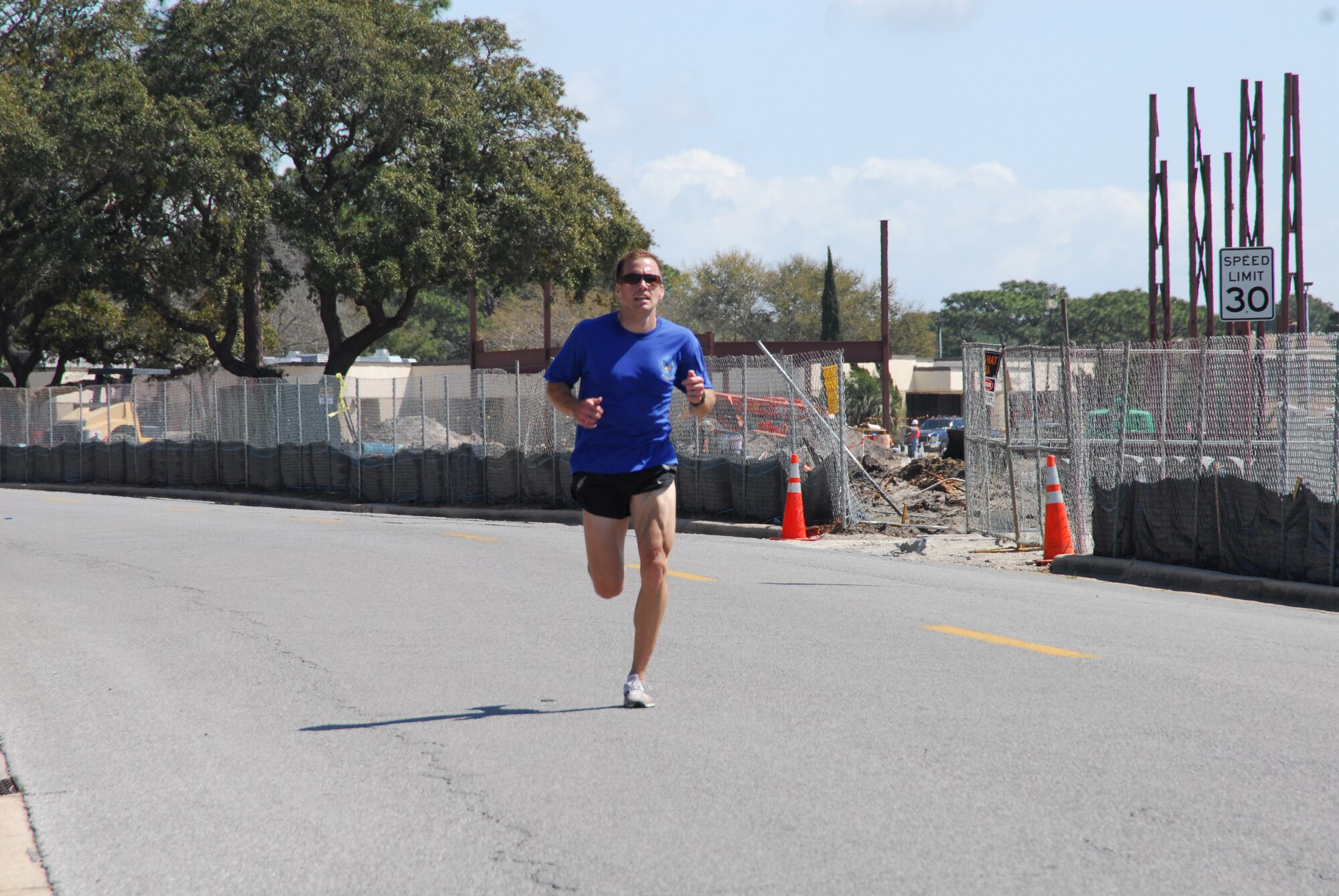 2nd Lt. John Dalrymple, 325th Air Control Squadron student, finished in first place with a time of 17:00 in the Air Force Assistance Fund 5k Run today.  (U.S. Air Force photo by Susan Trahan)