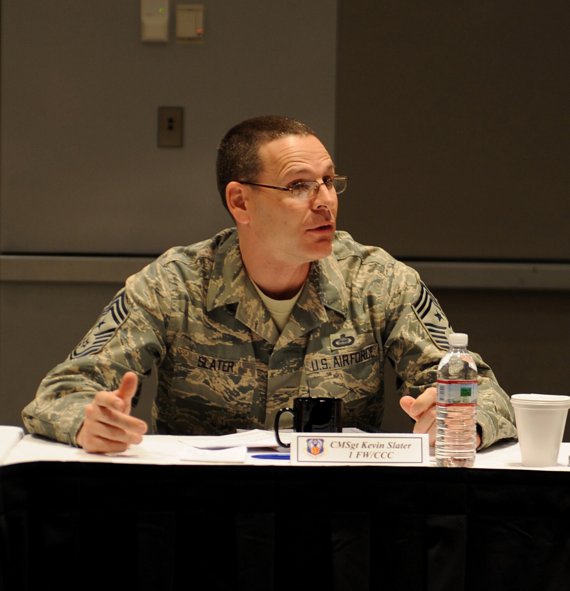 LANGLEY AIR FORCE BASE, Va. – Chief Master Sgt. Kevin Slater, 1st Fighter Wing command chief, speaks to a group of command chiefs during the 9th Air Force Total Force Conference March 4. The conference recognizes the top performers of the 9th AF and provides a time for the commanders of each wing to meet. (U.S. Air Force photo/Airman Rebecca Montez)