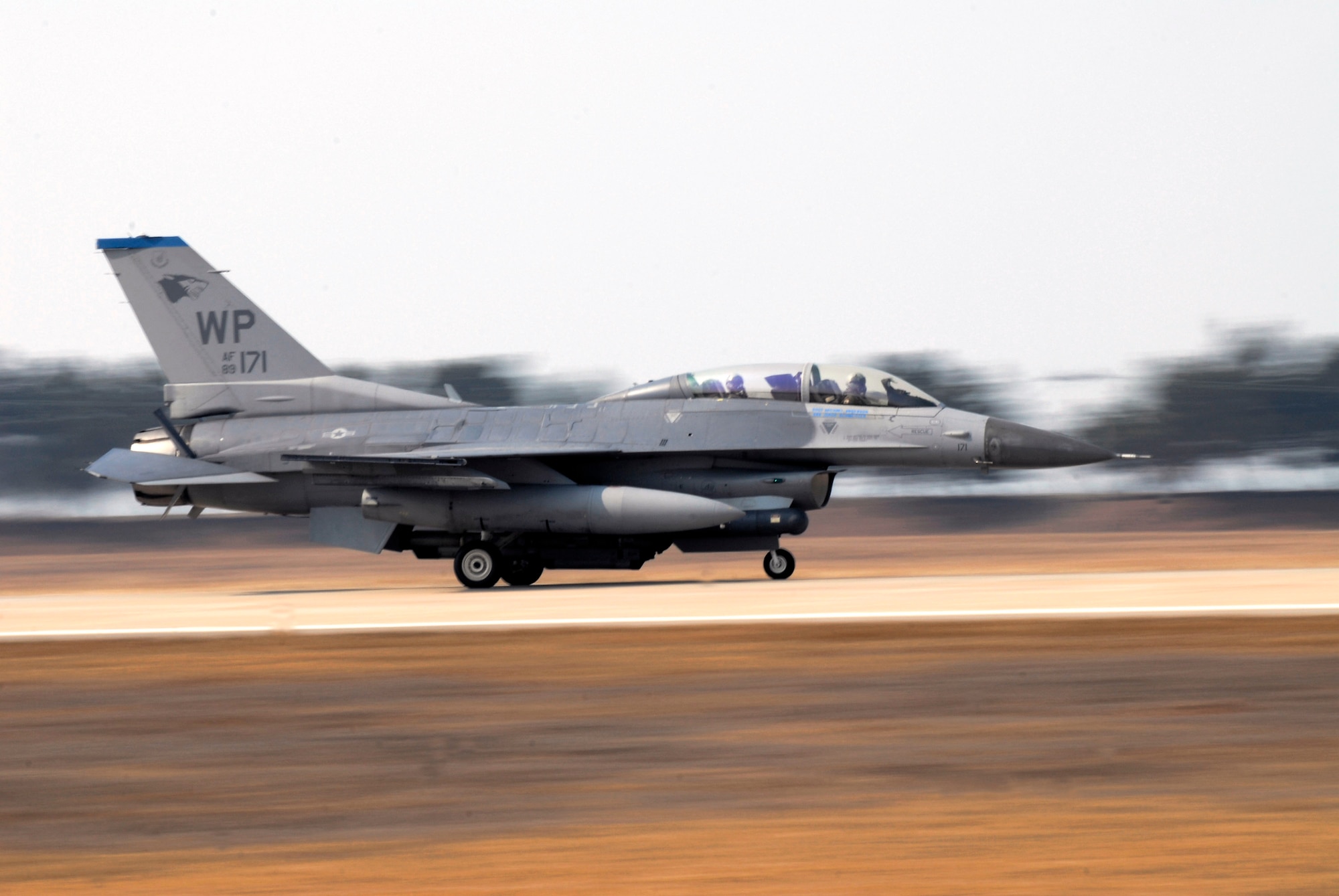 Kim Myung Jung, Gunsan City's Korean National Police chief, takes a high-speed taxi run at Kunsan Air Base, Republic of Korea March 4 in an F-16 Fighting Falcon piloted by Col. J.D. Harris, 8th Fighter Wing commander. Mr. Kim visited the base while participating in Kunsan's Pilot for a Day program. (U.S. Air Force photo/Staff Sgt. Jason Colbert)