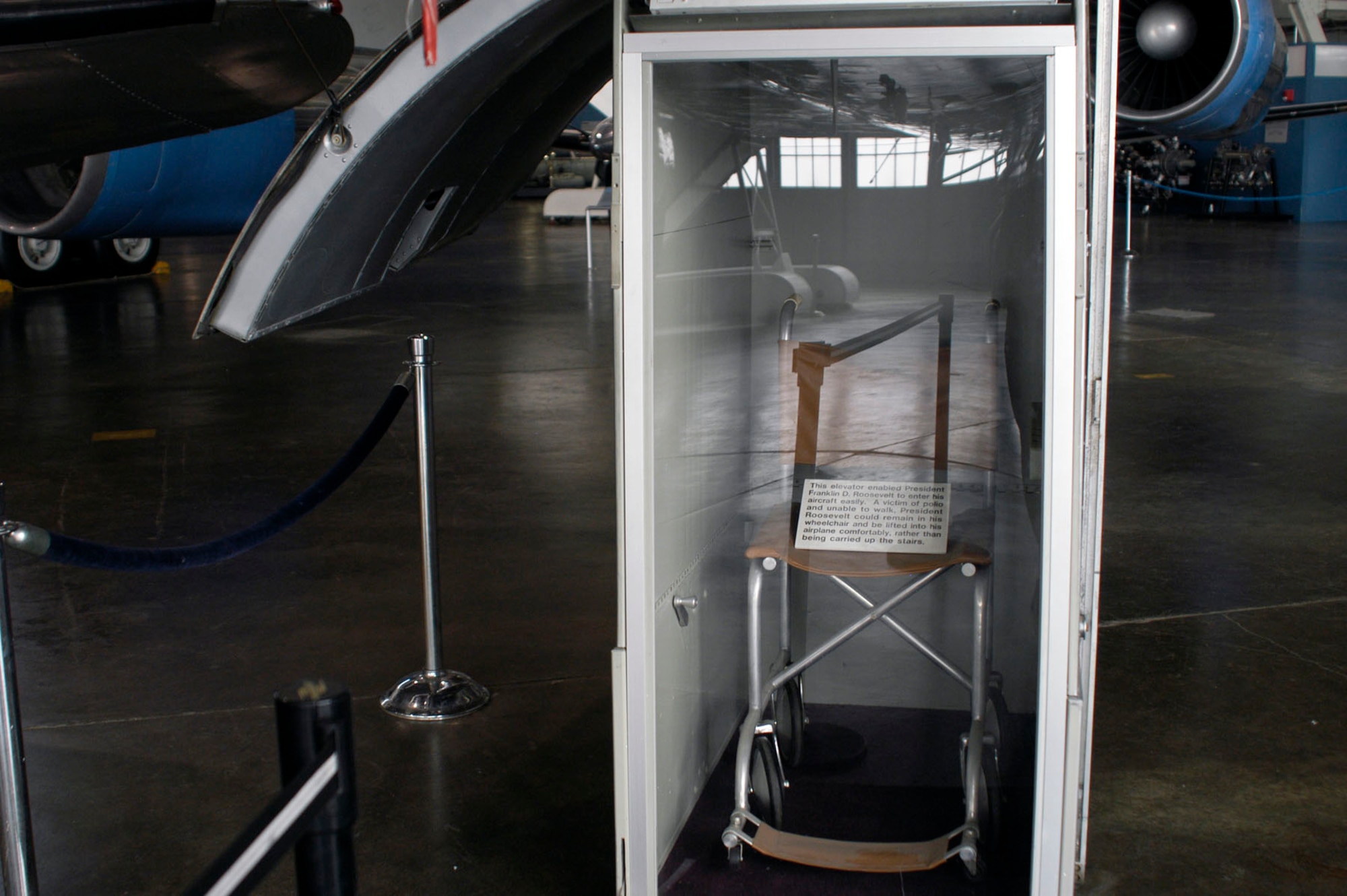 DAYTON, Ohio -- "Sacred Cow" elevator on display in the Presidential Gallery at the National Museum of the United States Air Force. This elevator enabled President Franklin D. Roosevelt to enter the aircraft easily. A victim of polio and unable to walk, President Roosevelt could remain in his wheelchair and be lifted into his airplane comfortably, rather than being carried up the stairs. (U.S. Air Force photo)