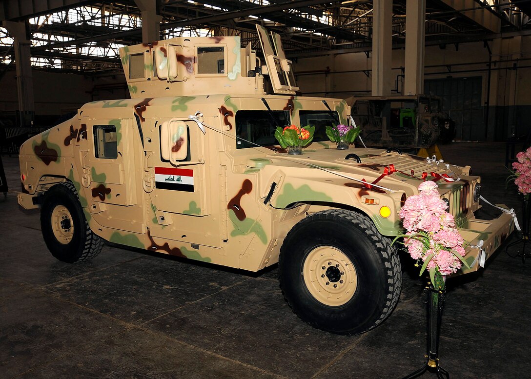 An M1114 HMMWV is called Project One because it is the first vehicle to go through the overhaul production by an all Iraqi maintenance crew March 4 at Taji, Iraq. Members of the Iraqi army worked on the transmission, engine, drive train and paint job. (U.S. Air Force photo/Senior Airman Jacqueline Romero) 
