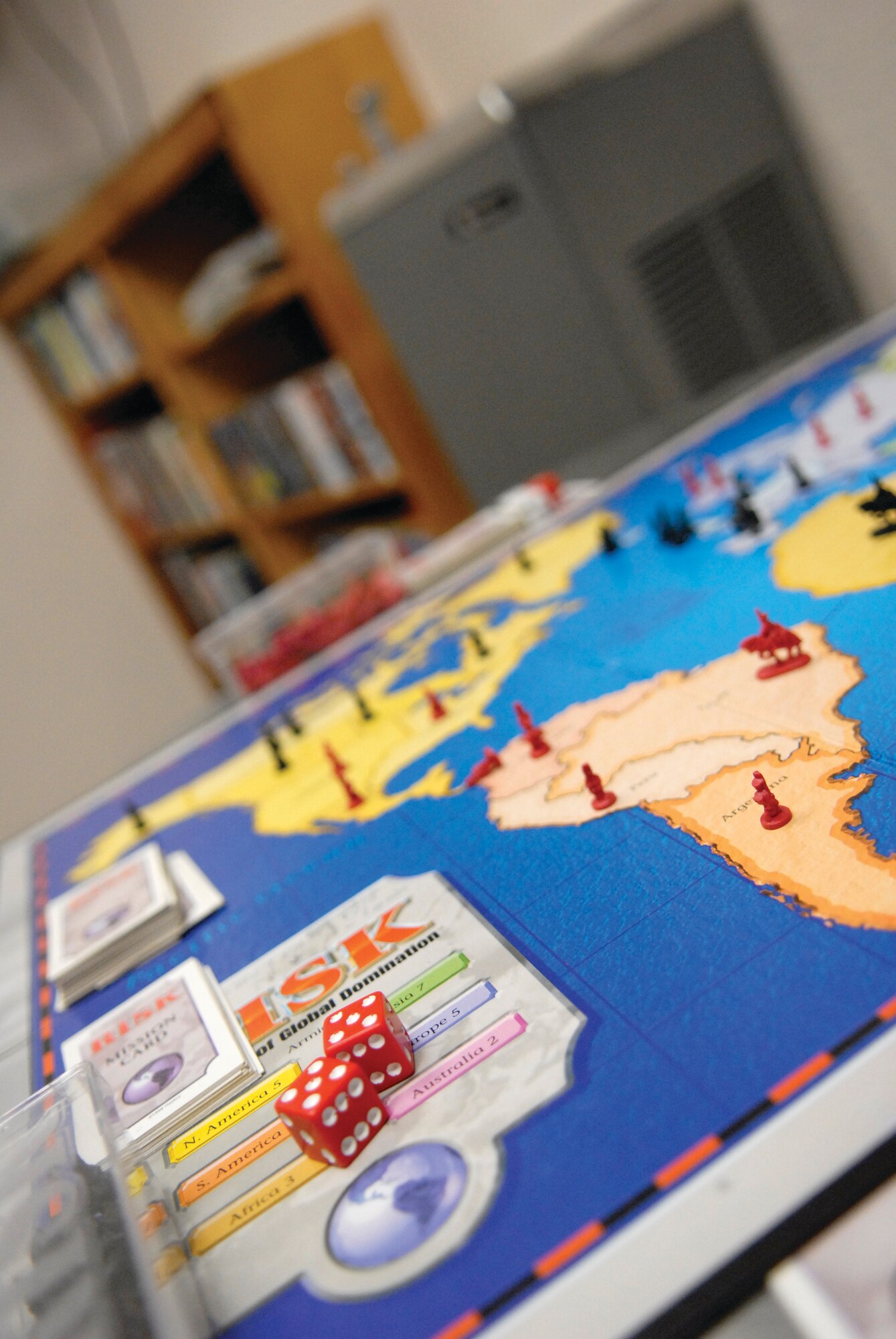 Inmates are confined in the small day room when not in their cells. Board games, books and a television are provided at the facility. (photo/Debbie Silliman-Wolfe)