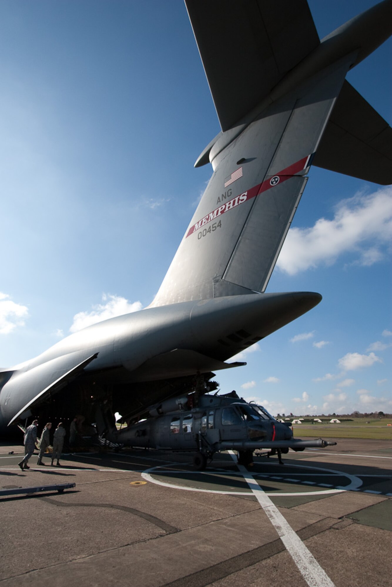 Members of the 56th Rescue Squadron Aircraft Maintenance Unit and Tennessee Air National Guard personnel load an HH-60 Pavehawk into a C-5 Galaxy March 5, 2009 at RAF Lakenheath, England. The 56th RQS is heading to the U.S. for high altitude operations and restricted visibility approach training. (U.S. Air Force photo by Tech. Sgt. Jason Passmore)