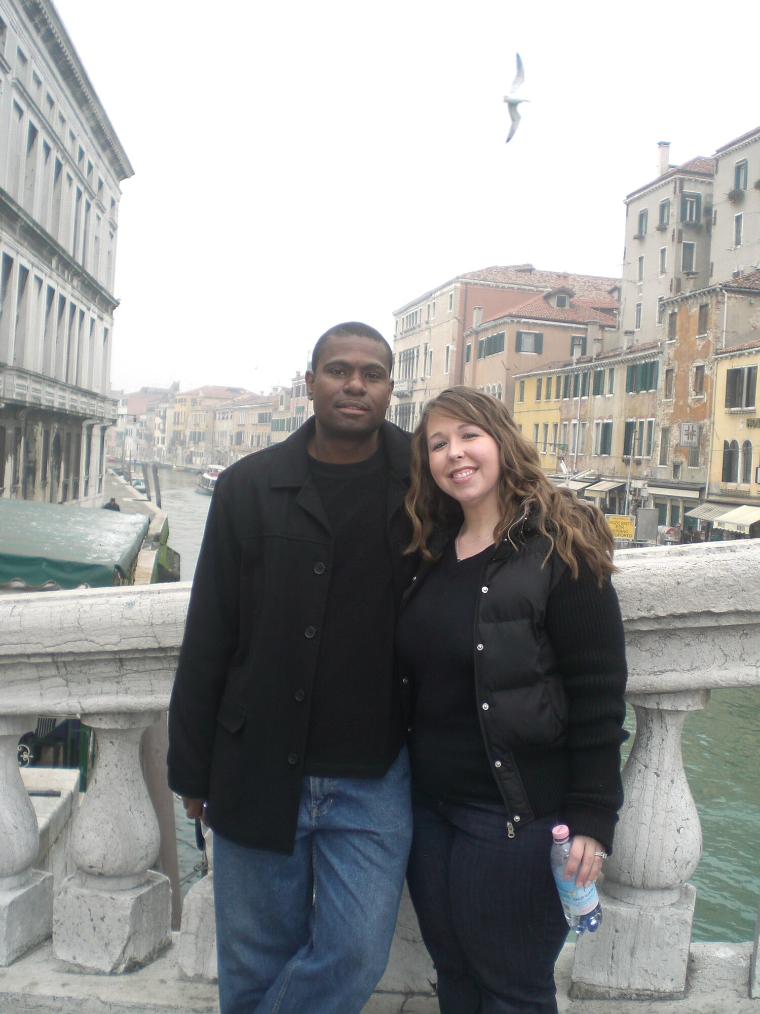 Staff Sgt. Chas and Samantha Adams pause for a photo during their European vacation in Feb. 2008 on one of the more than 400 bridges which connect some of the more than 100 islands of Venice, Italy.  Samantha, now enrolled in her second Aviano Biggest Winner Contest, has lost 50 pounds and strengthened her relationship with her husband.  (Courtesy photo)