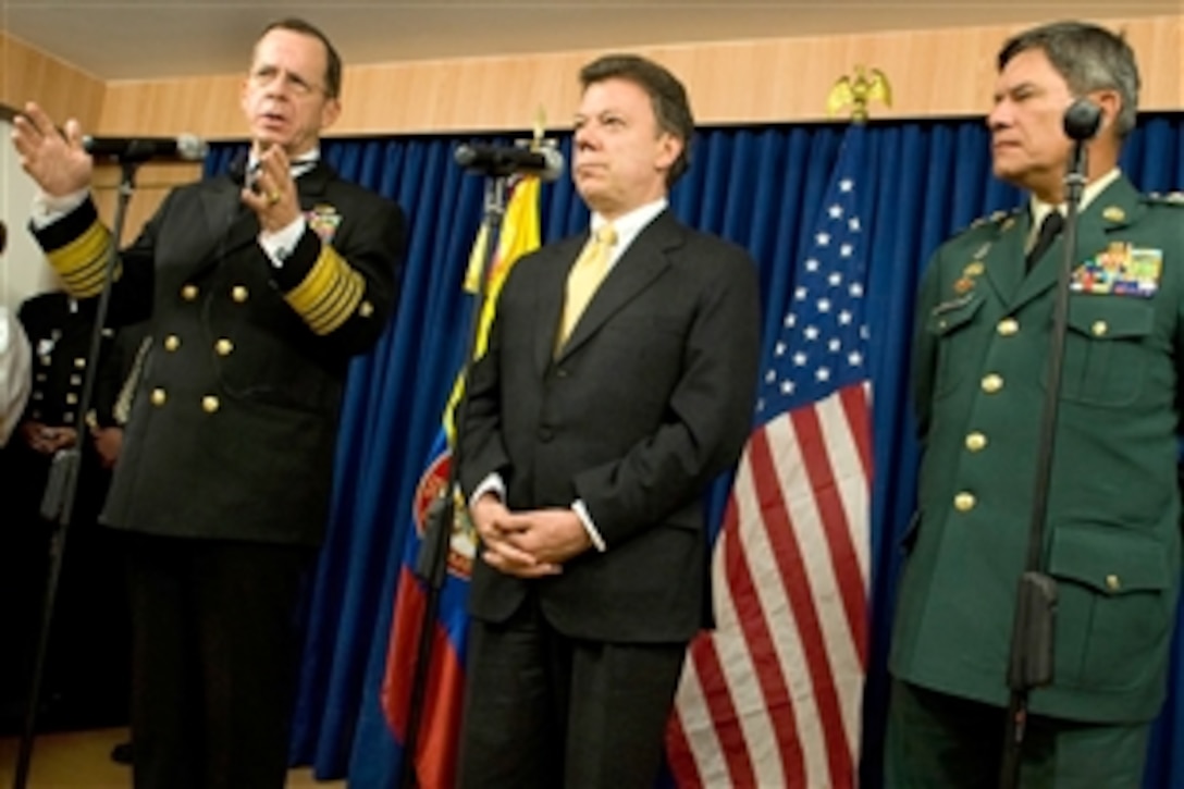 Chairman of the Joint Chiefs of Staff U.S. Navy Adm. Mike Mullen speaks while Colombian Minister of Defense Dr. Juan Santos and Colombian Chief of Defense Gen. Freddy Padilla listen at the National Defense Ministry in Bogota, Colombia, March 5, 2009. The chairman visited the country to meet with senior Colombian officials and discuss ongoing U.S. and Colombian relations. 