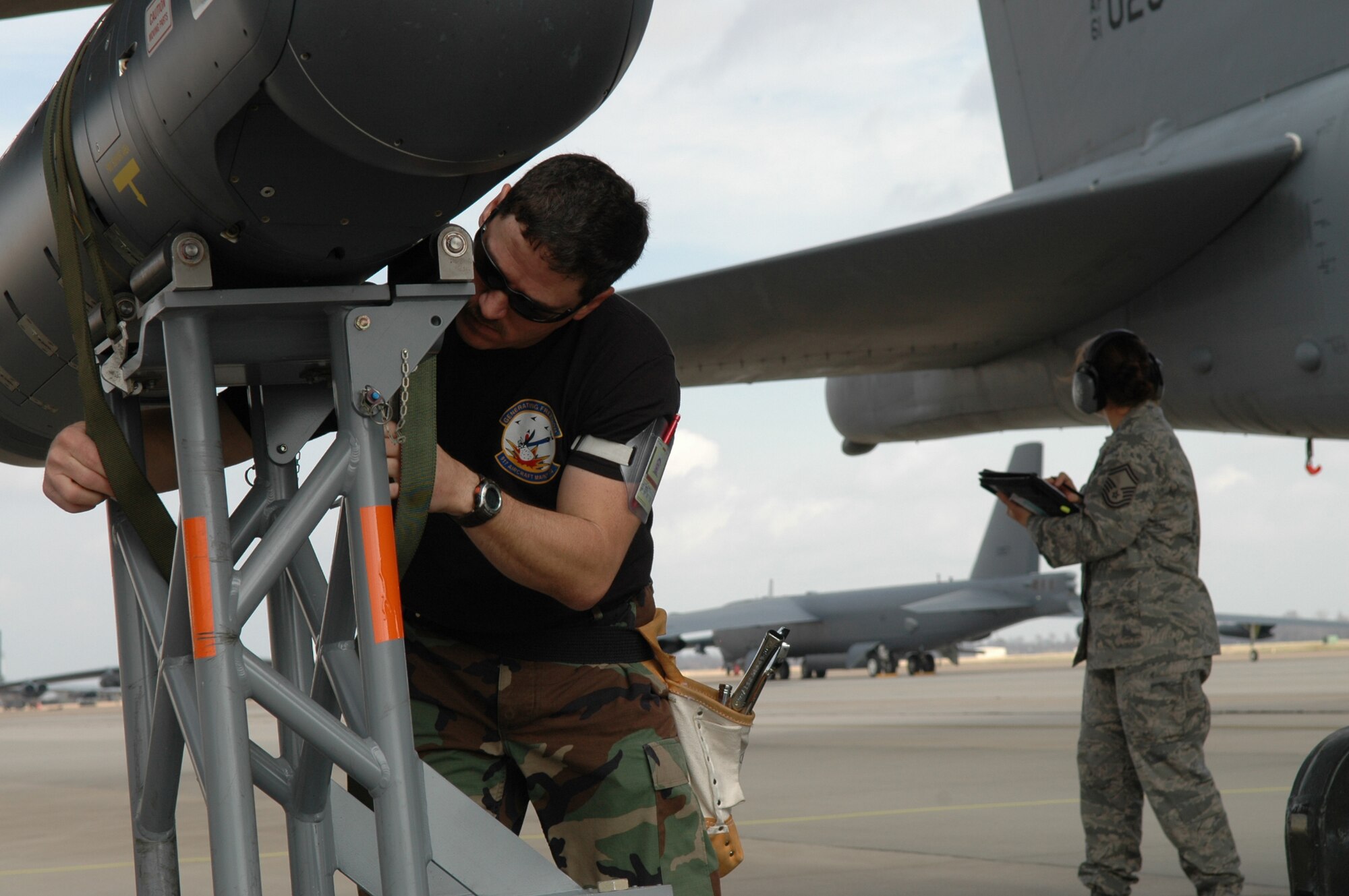 The 917th Wing Airmen of the Quarter for January - March 2009, Senior Airman Bobby Trichel, 917th Aircraft Maintenance Squadron, removes a Lightening Pod from a B-52 on Mar. 7 at Barksdale AFB, La. (U.S. Air Force Photo/Staff Sgt. Ebony Nichols)