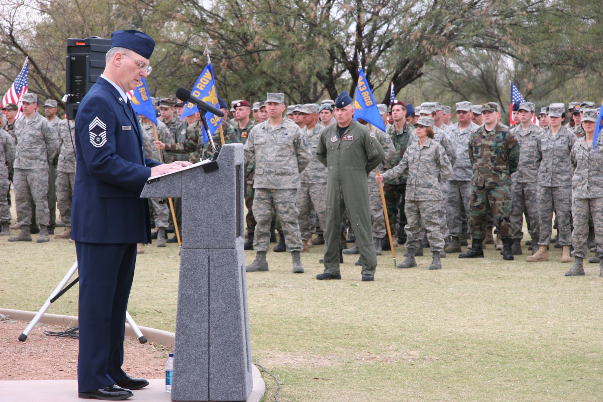 DAVIS-MONTHAN AIR FORCE BASE, Ariz. -- Chief Master Sgt. Craig Bergman (USAFR Ret.) makes remarks as the guest speaker at the memorial service in honor of the men of PONY 1-2 that died in a helicopter crash Sunday, March 12, 1989. The event was held March 8 at Heritage Park here. Chief Bergman retired as Superintendent of the 943rd Maintenance Squadron. U.S. Air Force photo/Master Sgt. Ruby Zarzyczny