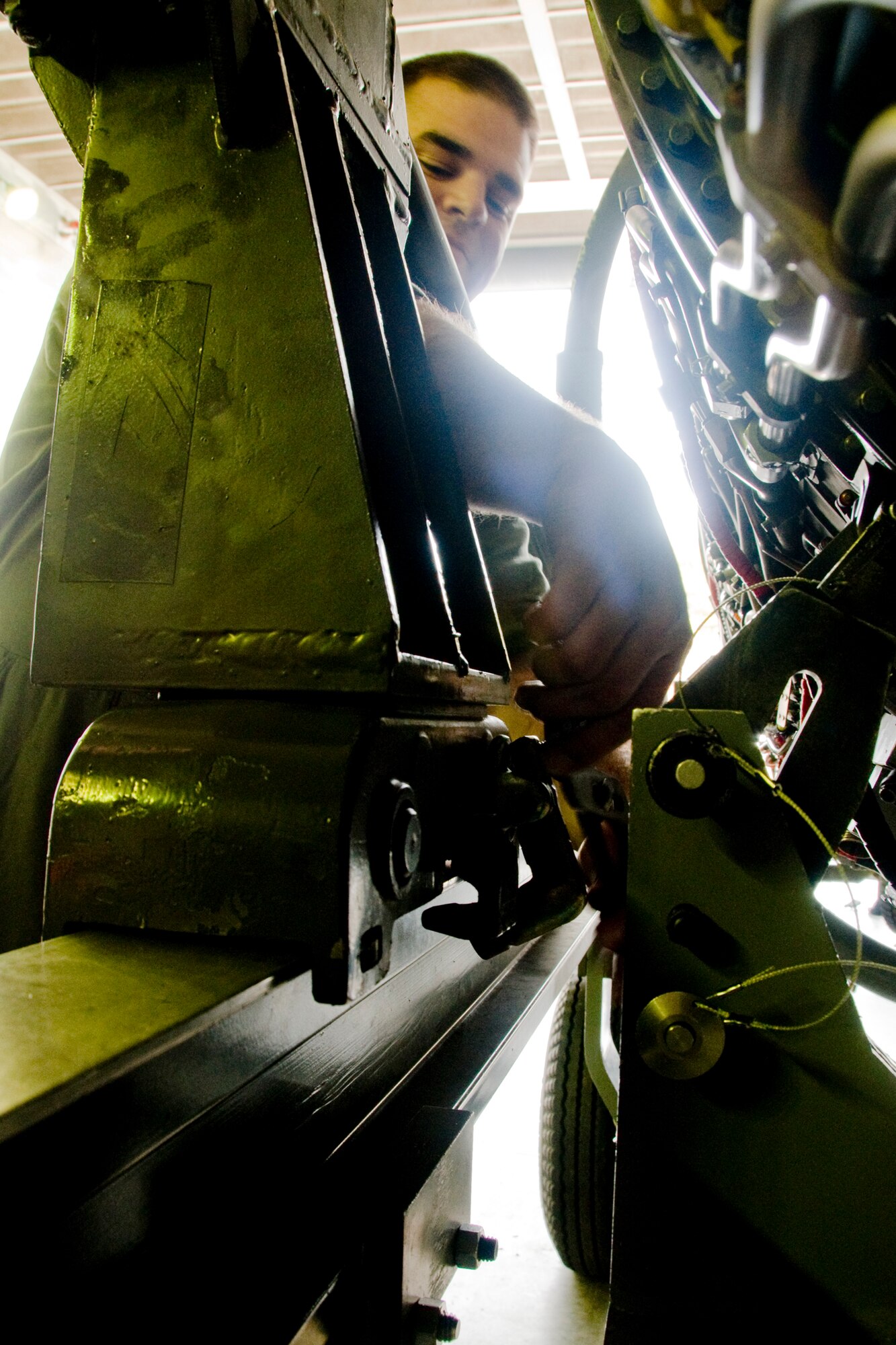 MISAWA AIR BASE, Japan -- Staff Sgt. Jared Langston, 35th Maintenance Squadron aerospace-propulsion technician, prepares test cell gear March 3, 2009. Attention to detail is imperative during testing, and close to a dozen operations checks are performed on the engines. (U.S. Air Force photo by Senior Airman Jamal D. Sutter)