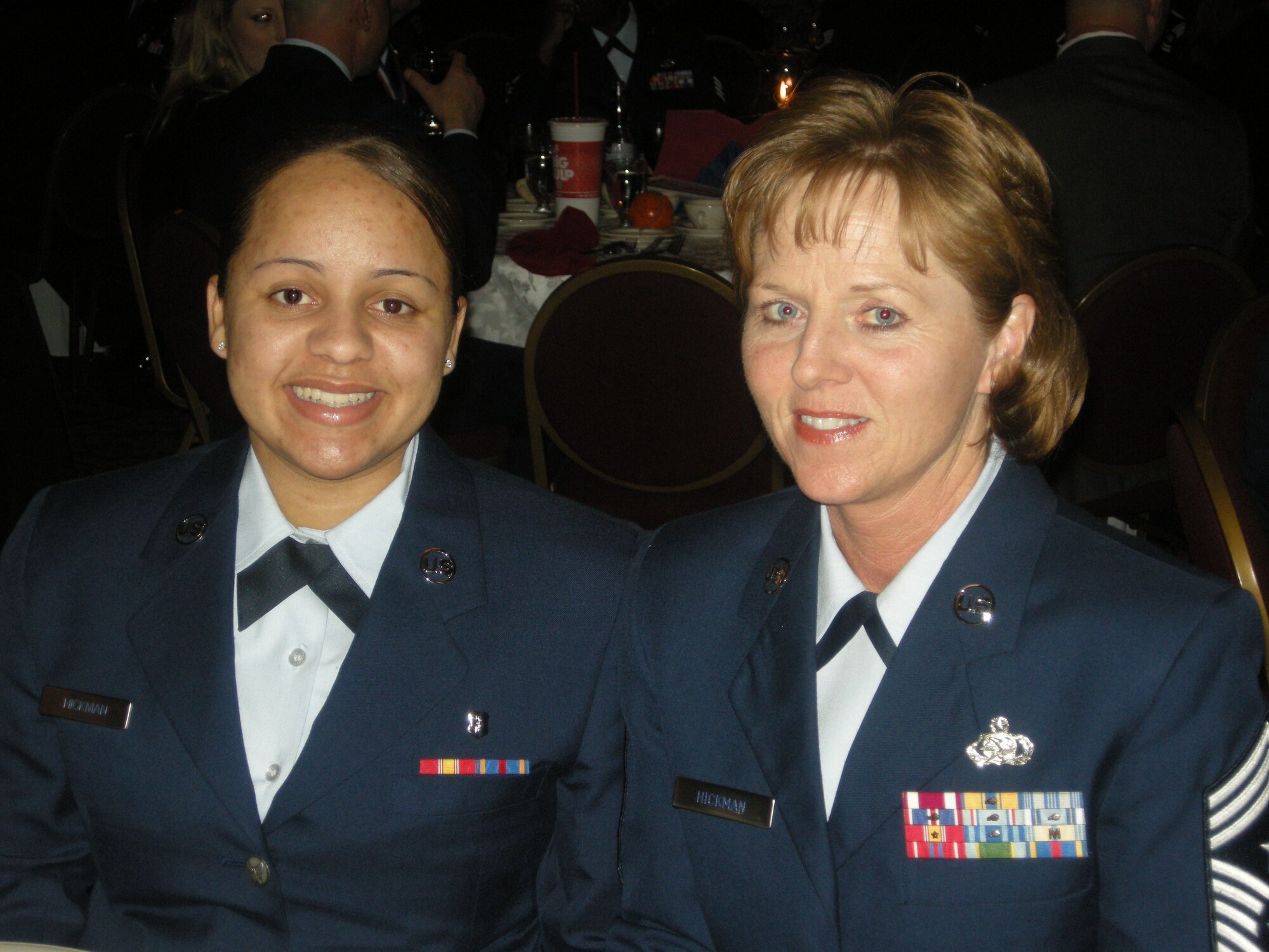 Command Chief Master Sgt. Patti Hickman shares a moment with her daugher Airman First Class Tara Hickman at the 459th Air Refueling Wing annual awards banquet.  Chief Hickman has served in the Air Force for 29 years and is leaving the 459th ARW in April for an IMA position with the Air Force District Washington.