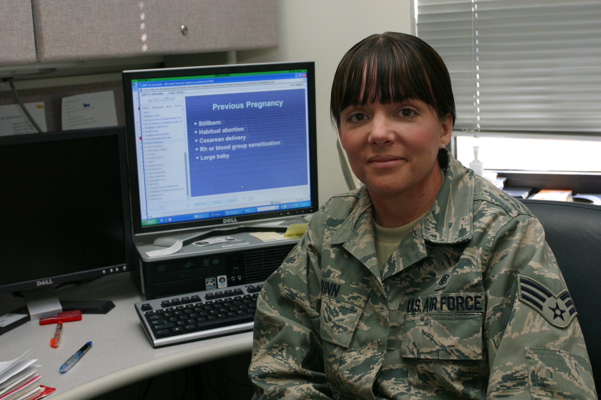 Senior Airman Melinda Gunn studies at her desk for nursing classes. The Air Force Reserve has given her a lot of experience in health care. (U.S. Air Force Photo/Senior Airman Brandon Craig)