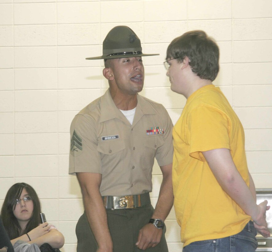 Marine Corps drill instructors visited numerous Iowa,  Nebraska and Illinois locations March 9-13 to join more than 1,000 young men and women who have signed up for the Marine Corps, as well as their families and friends, for dinner, a presentation on recruit training, and an unforgettable 25-minute taste of what these “poolees” can expect at boot camp.