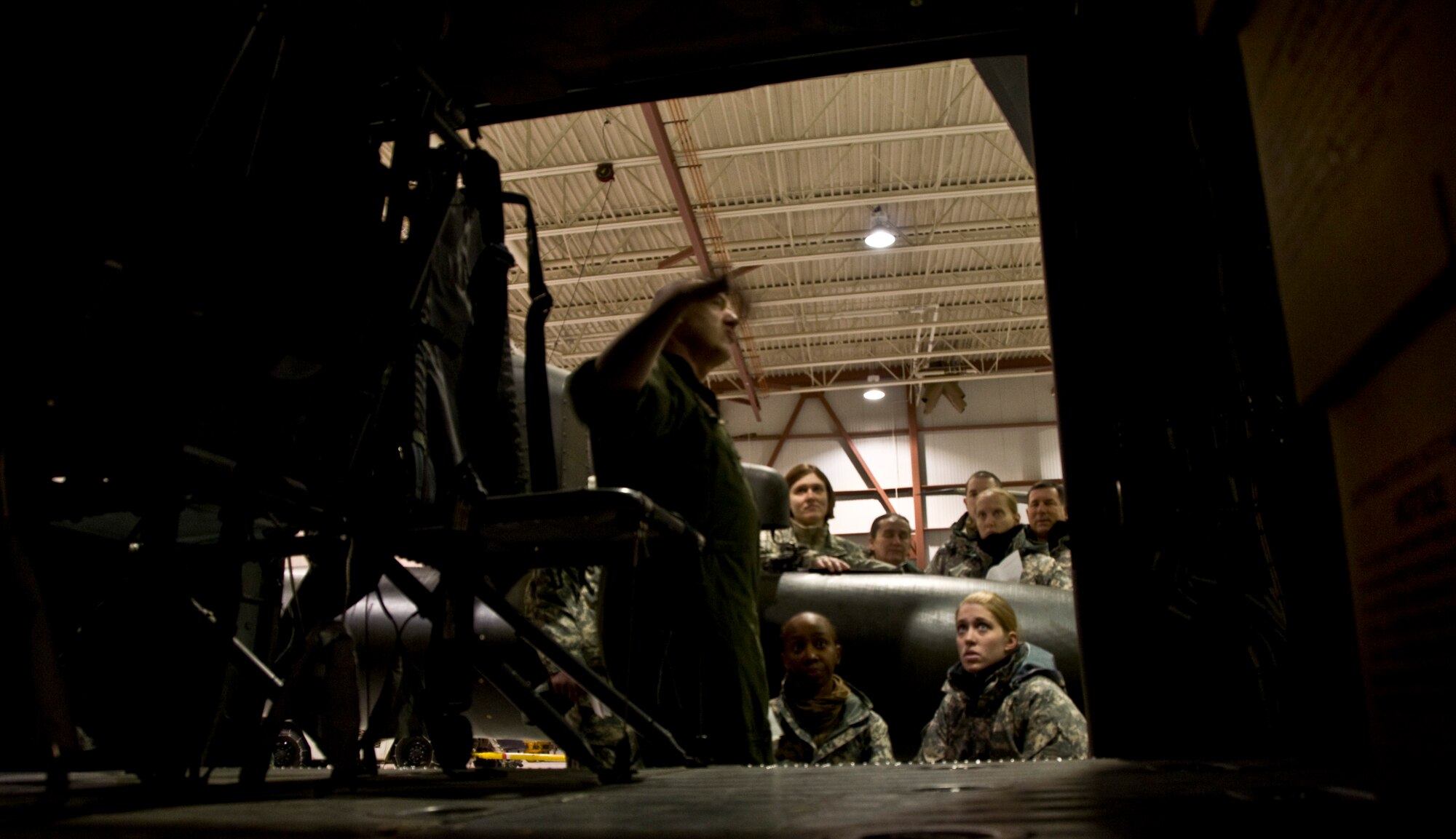 Sgt. 1st Class James Morris of the 1st 207 Aviation Regiment briefs members of the Army Veterinary Corps before their team flies via Black Hawk to the village of Alakanuk, Alaska, on March 7, 2009. Operation Arctic Care is a joint military medical readiness exercise that brings no-cost health care to underserved Alaskan residents, including dental, optometry and veterinary support. This year's Navy-led mission has teams in 11 villages in Western Alaska's Yukon-Kuskokwim Delta region.(U.S. Air Force photo by Senior Airman Christopher Griffin)