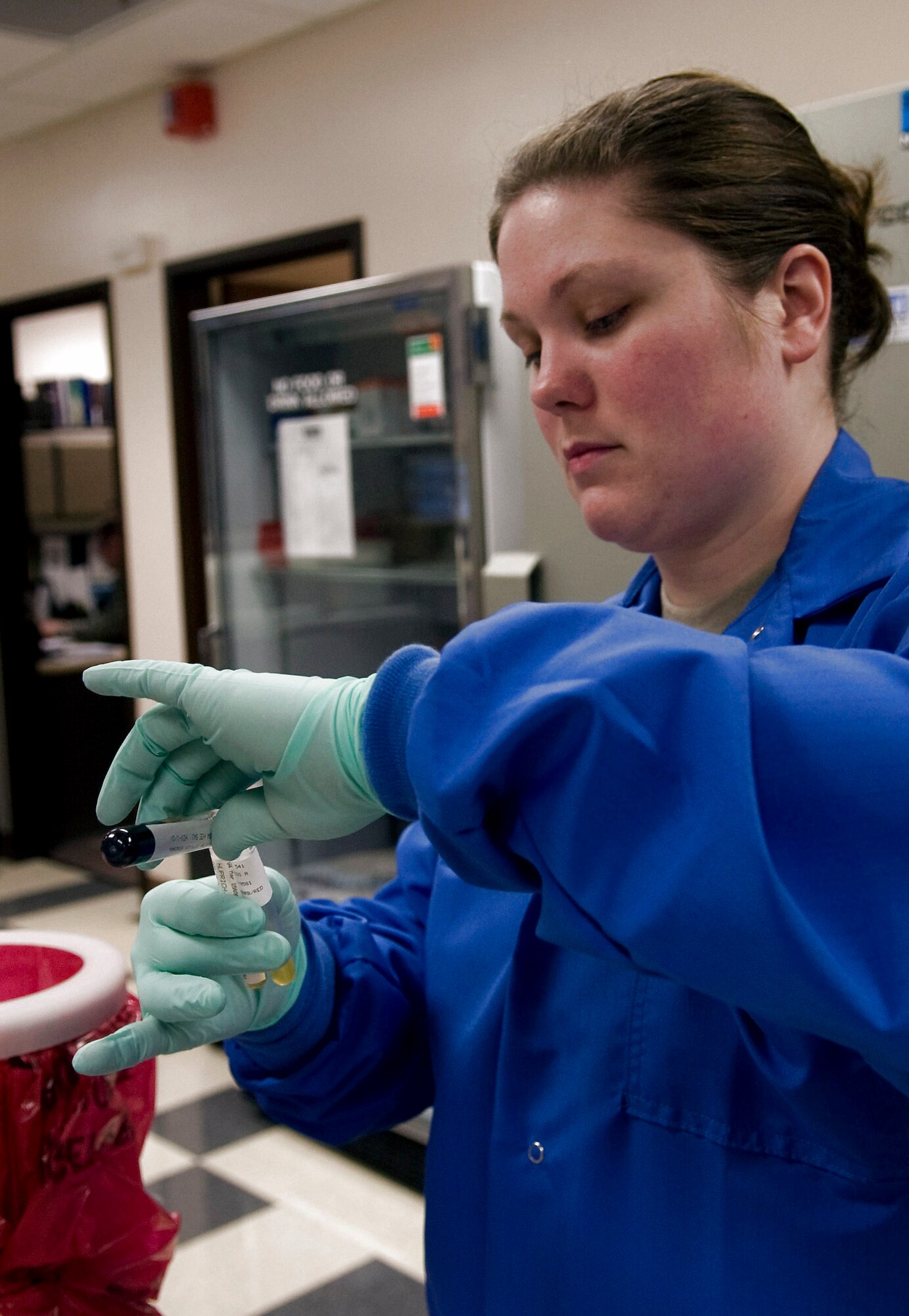 Staff Sgt. Toni Thompson prepares blood specimens to be sent to an off-base laboratory for further testing March 4 at Eielson Air Force Base, Alaska. Sergeant Thompson is a 354th Medical Group clinical lab technician. (U.S. Air Force photo/Airman 1st Class Laura Max) 
