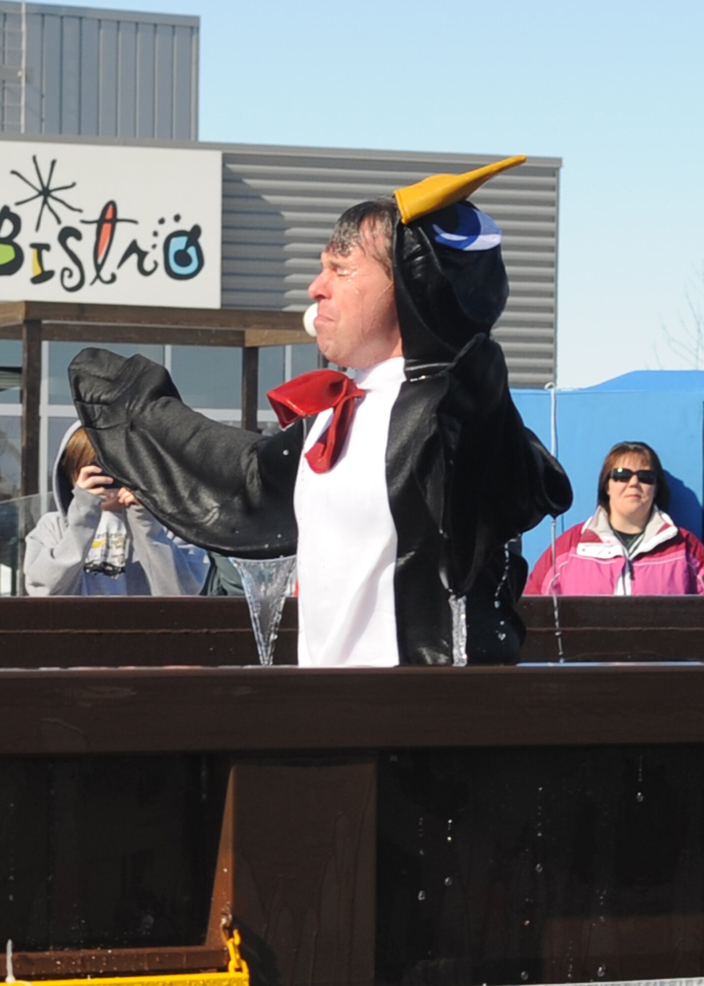 Col. John Michel, 319th Air Refueling Wing commander, takes his first Polar Plunge at Canad Inns in Grand Forks, N.D. The money raised from the plunge helps support the Special Olympics. (USAF Photo/Staff Sgt. Suellyn Nuckolls)