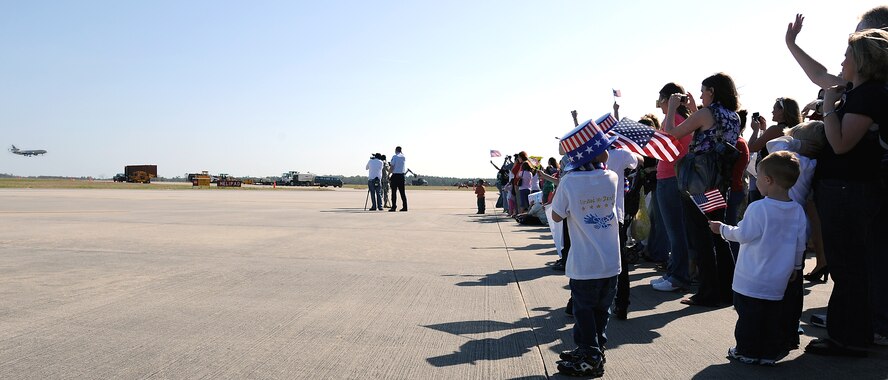 MOODY AIR FORCE BASE, Ga. -- Family, friends and loved ones anxiously await the return of deployed members from the 75th Aircraft Maintenance Unit here March 9. The 75th AMU has been deployed to Bagram Air Base, Afghanistan, for about six months. (U.S. Air Force photo by Airman Joshua Green)