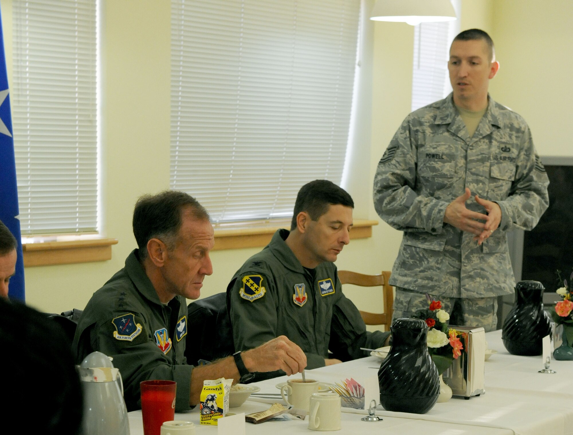 DYESS AIR FORCE BASE, Texas -- Technical Sgt. Robert Powell, president of the 56 Club, highlights the 56 Clubs accomplishments over the past year for Lieutenant General Norman Seip, 12th Air Force commander, during his lunch with the 56 Club here, March 4.  General Seip visited Dyess AFB March 3-4.  (U.S. Air Force photos by Senior Airman Domonique Simmons)