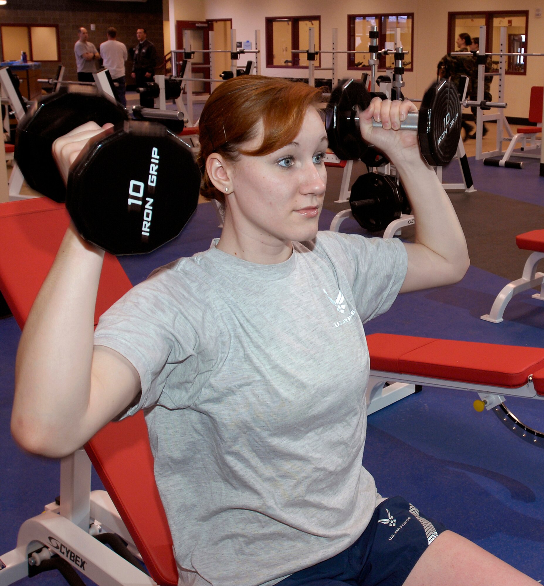 ELMENDORF AIR FORCE BASE, Alaska -- Senior Airmen Laura Turner, 3rd Wing Public Affairs, works out at the Elmendorf Fitness Center. As of March 1, all phsyical training testing is conducted through the Health and Wellness Center here. (U.S. Air Force file photo)