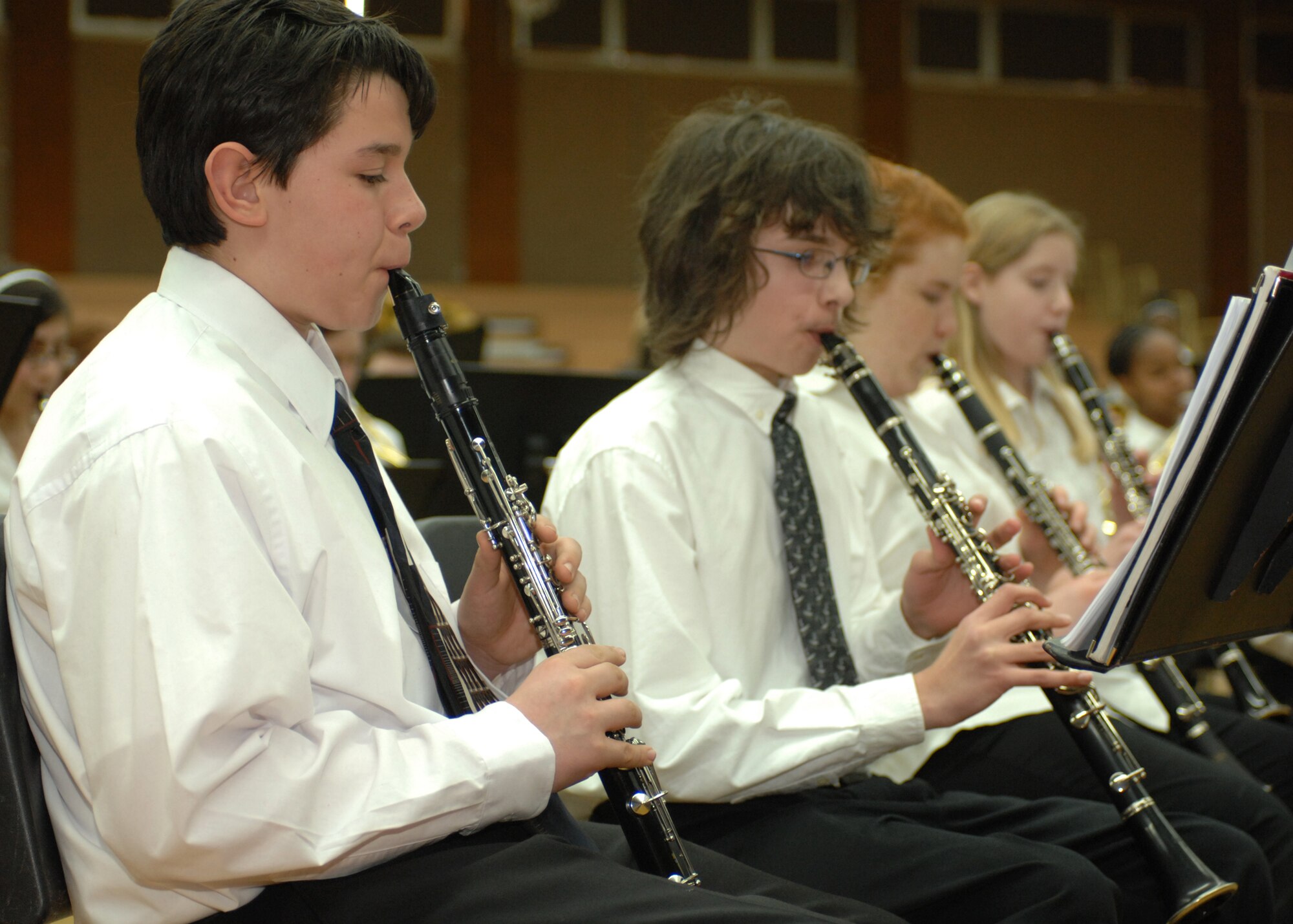 SPANGDAHLEM AIR BASE, Germany -- Members of the clarinet section perform March 4, 2009 at the Skelton Memorial Fitness Center.  Advanced middle and high school band students from Department of Defense schools performed for the Spangdahlem community after only two joint rehearsals.  (U.S. Air Force photo Senior Airman Jenifer H. Calhoun)