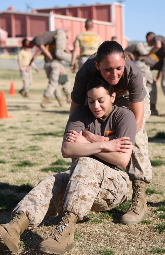 Corporals Course students participate in the ‘buddy-drag’ portion of the Combat Fitness Test that the Marines in the course participated in March 10.