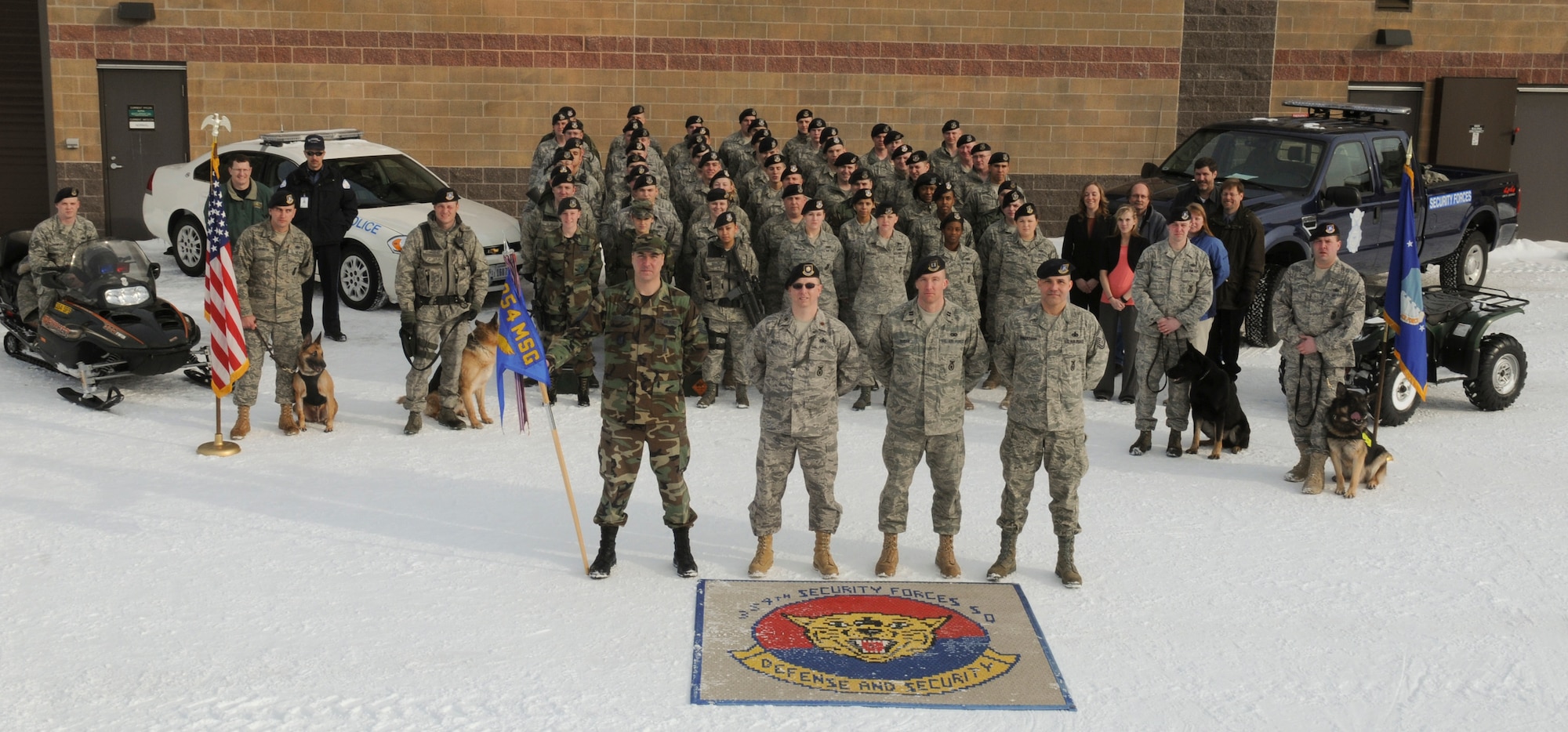 The 354th Security Forces Squadron poses for a group photo March 10, 2009, Eielson Air Force Base, Alaska. The squadron was named the 2008 Pacific Air Forces Best medium-size Security Force Unit. (U.S. Air Force photo/Airman 1st Class Laura Max)