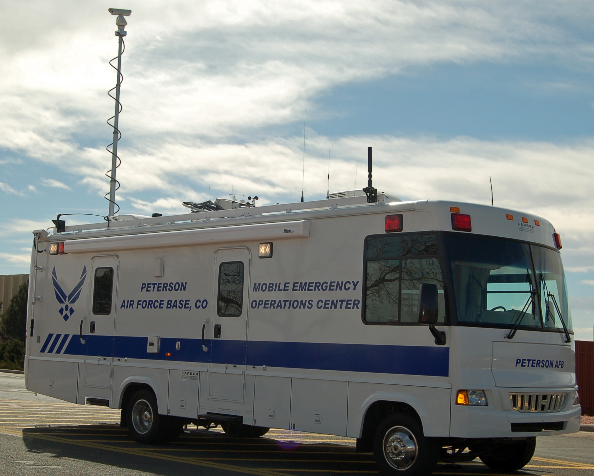 The Mobile Emergency Operations Center, known as MEOC, is on stand-by outside the 21st Space Wing Civil Engineer Squadron Readiness building on Peterson Air Force Base. Along with radio access to state mutual aid, the MEOC provides resources to emergency responders on site at an incident command post including five workstations, an outside camera with zoom capabilities and an electronic Global Positioning System, also known as GPS, to map coordinates. (Photo by Thea Skinner)