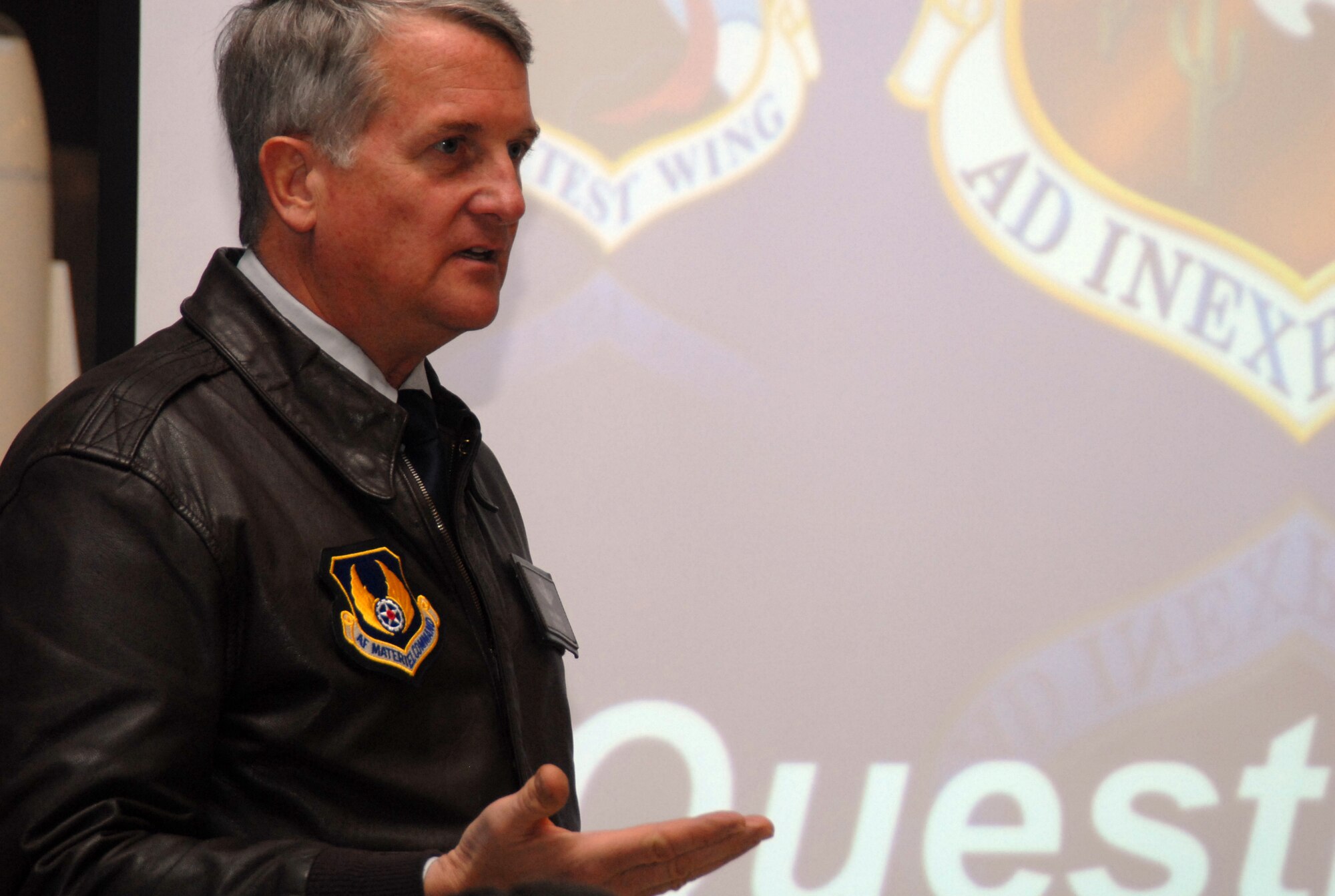 Maj. Gen. David Eichhorn, Air Force Flight Test Center commander, talks to the audience during a base reception at the AFFTC Museum March 6 for the California City and Mojave communities. Various leaders from California City and Mojave attended the event. (Air Force photo by Senior Airman Julius Delos Reyes)