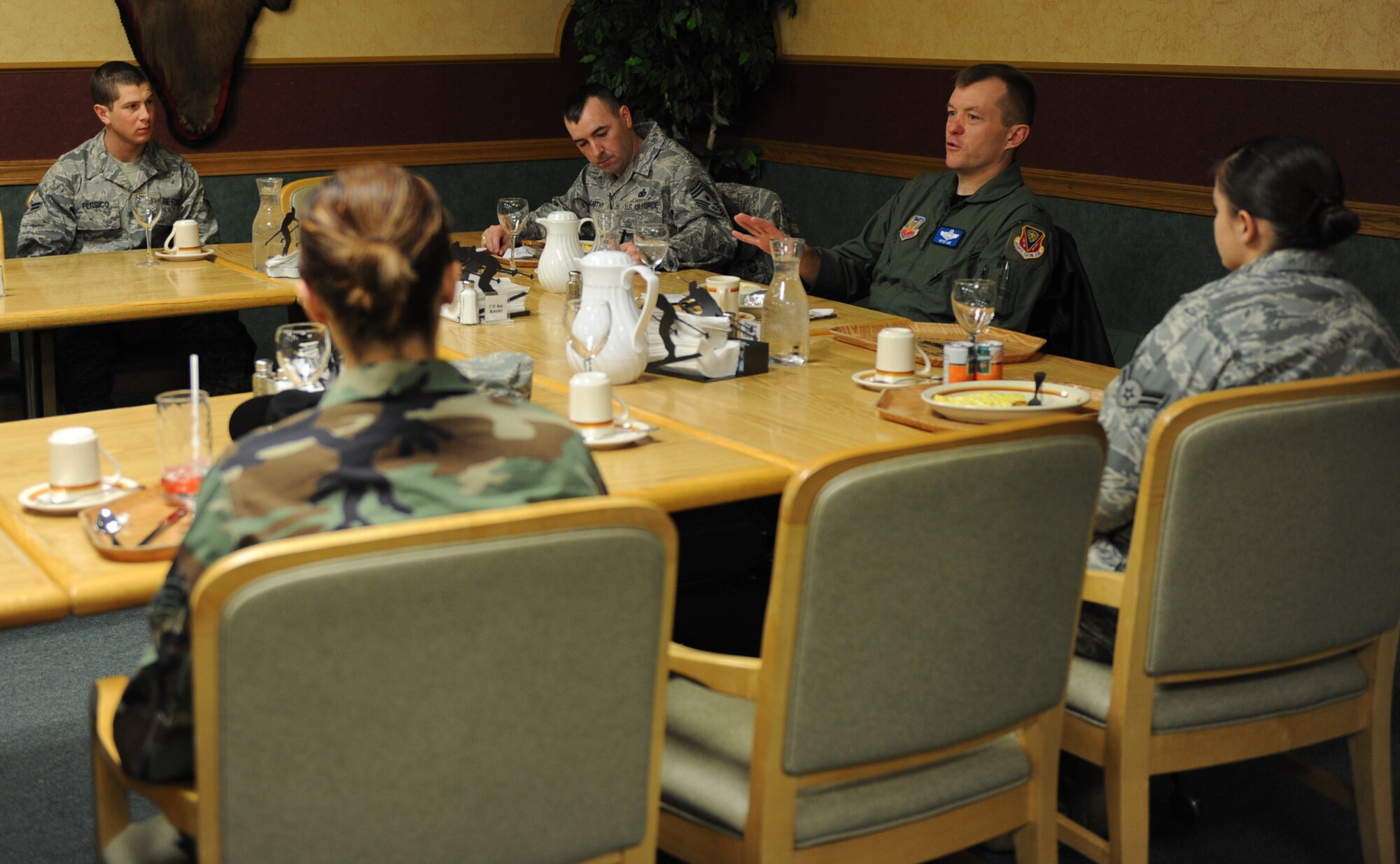 MOUNTAIN HOME AIR FORCE BASE, Idaho -- Col. Pete Lee,  366th Fighter Wing vice commander, outlines issues affecting the fighter wing while Chief Master Sgt. Ronald McCarthy, wing command chief, takes notes during the monthly senior leadership breakfast March 10 at the Wagon Wheel Dining Facility. Each month, the base’s senior leadership invites junior Airmen from different squadrons here to attend the breakfast and hear the latest news regarding the fighter wing.  The breakfast also allows these Airmen to ask questions and air concerns directly to the base’s leadership. (U.S. Air Force photo/Airman 1st Class Ashley Tank)