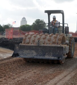 Augustino Moreno, contractor, prepares the ground for construction at the new base exchange site on March 5. The new $24 million Randolph BX will have double the merchandise space, eight additional stores and six eateries. (U.S. Air Force photo by Steve White)