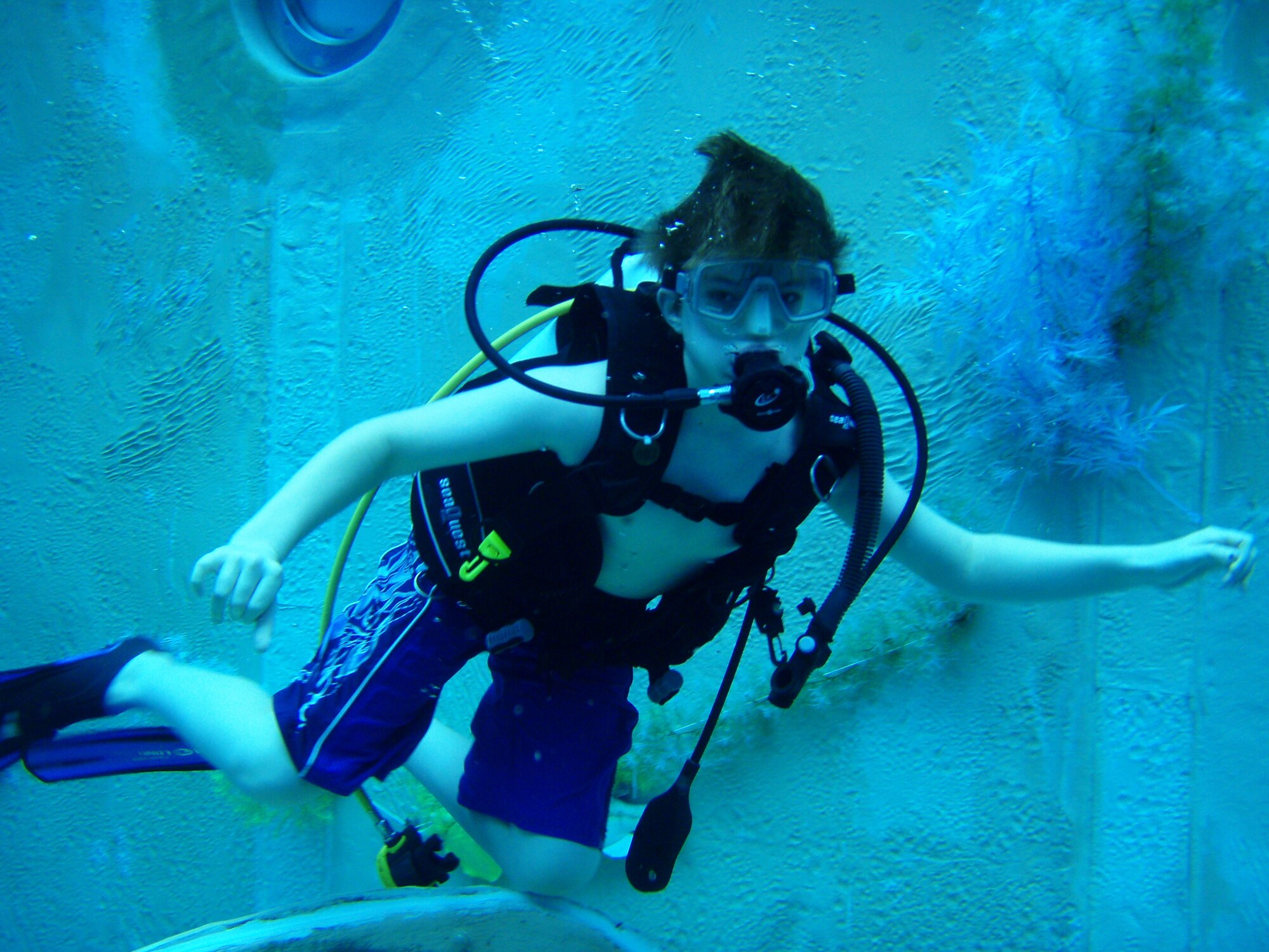SPANGDAHLEM AIR BASE, Germany -- Alex Wrede, son of Maj. Valerie Wrede, 52nd Medical Operations Squadron, practices his diving skills as part of the Intro to Scuba class offered by Outdoor Recreation March 04, 2009. The class is $74.00 per person, with all gear and instruction provided. (Courtesy Photo)