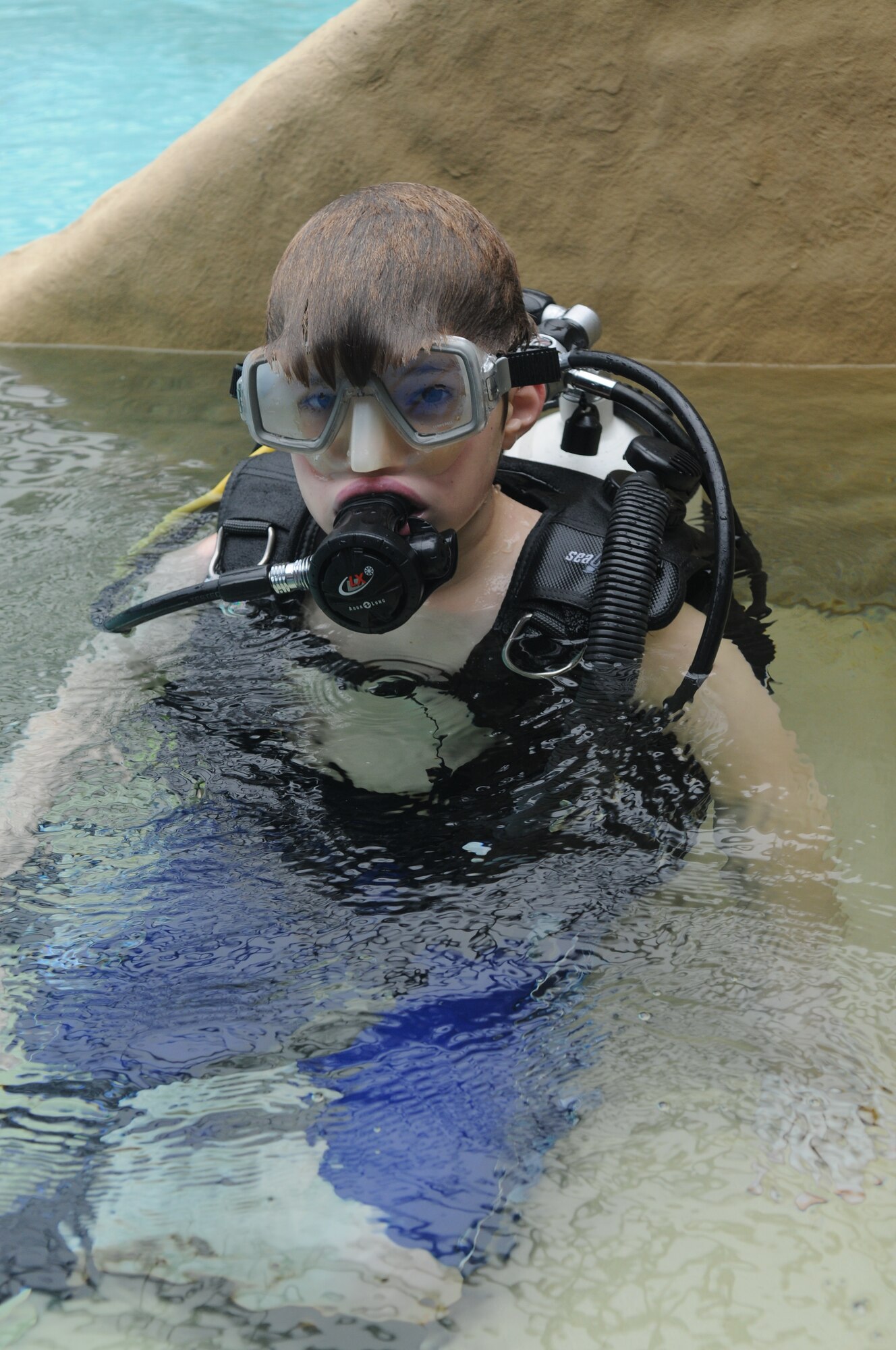 SPANGDAHLEM AIR BASE, Germany-- Alex Wrede, son of Maj. Valerie Wrede, 52nd Medical Operations Squadron,  comes up for a break during the Intro to Scuba class offered by Outdoor Recreation March 04, 2009. The class is $74.00 per person, with all gear and instruction provided. (U.S. Air Force photo by Airman 1st Class Staci Miller)