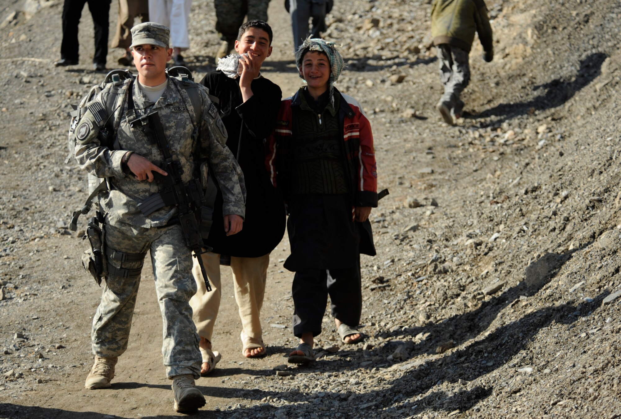 U.S. Army Sgt. Ramon Guzman from Army Civil Affairs provides security for members of the Panjshir Provincial Reconstruction Team during a site visit in Afghanistan Mar. 5, 2009, in support of Operation Enduring Freedom. (U.S. Air Force photo by Staff Sgt. James L. Harper Jr.)