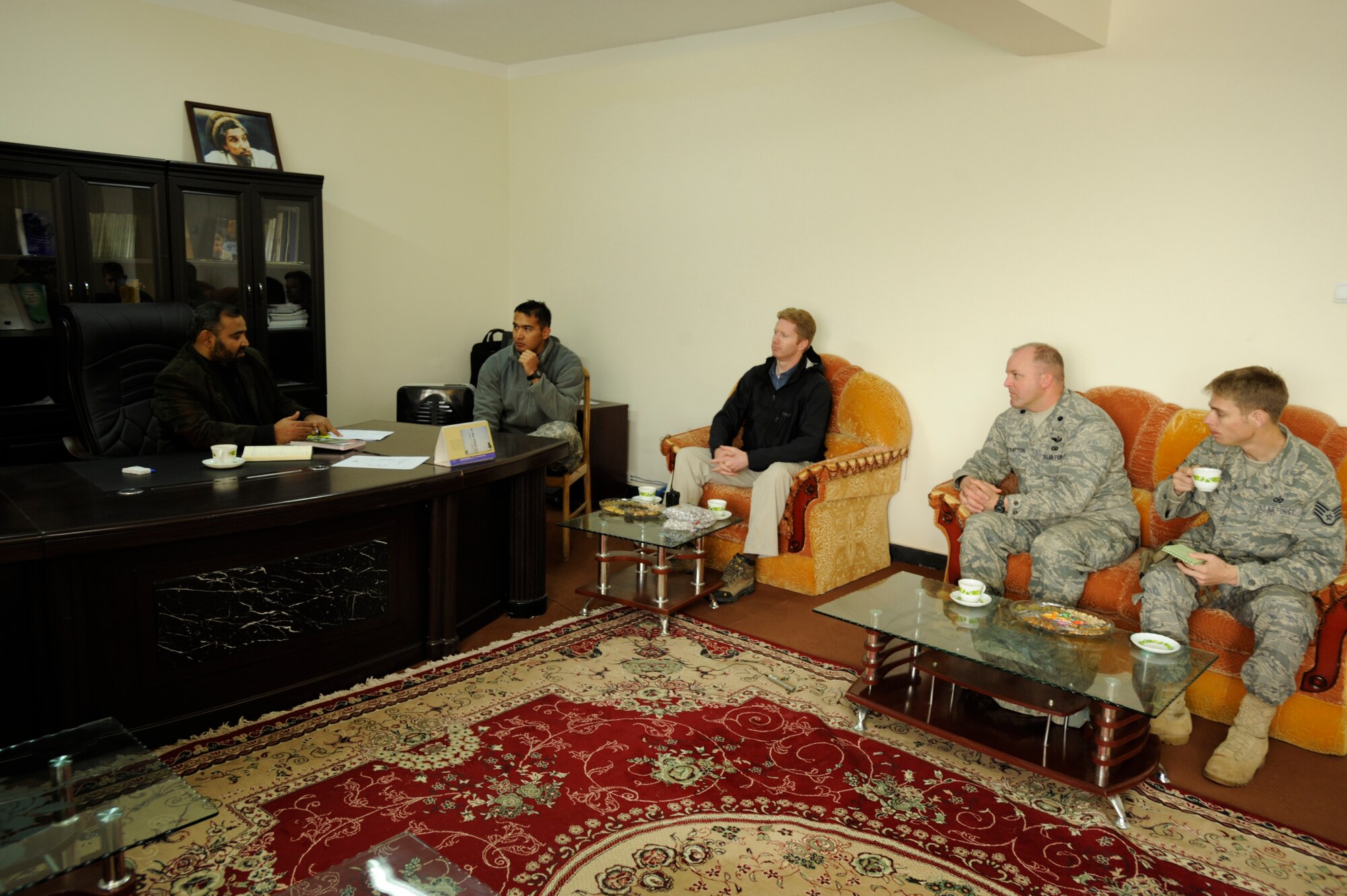 U.S. military and civilian agency members of the Panjshir Provincial Reconstruction Team conduct a meeting with the deputy governor Abdul Kabiri to discuss issues pertaining to the province Mar. 3, 2009, in support of Operation Enduring Freedom. (U.S. Air Force photo by Staff Sgt. James L. Harper Jr.)