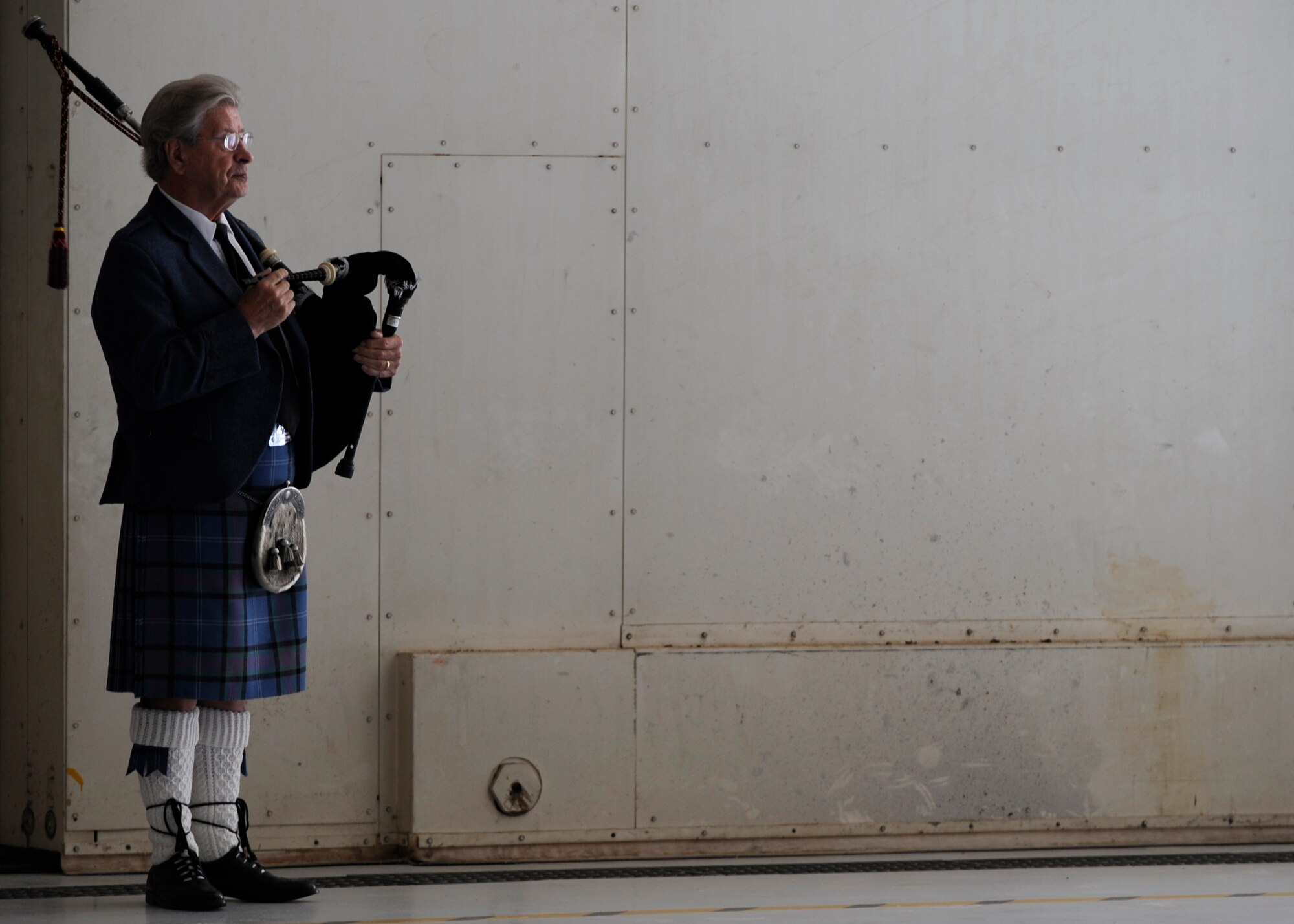MCCONNELL AIR FORCE BASE, Kan. -- James Lindsey, 84, waits to play the bagpipes during Col. Michael V. Krueger’s memorial service, March 9. (Photo by Airman Justin Shelton)
